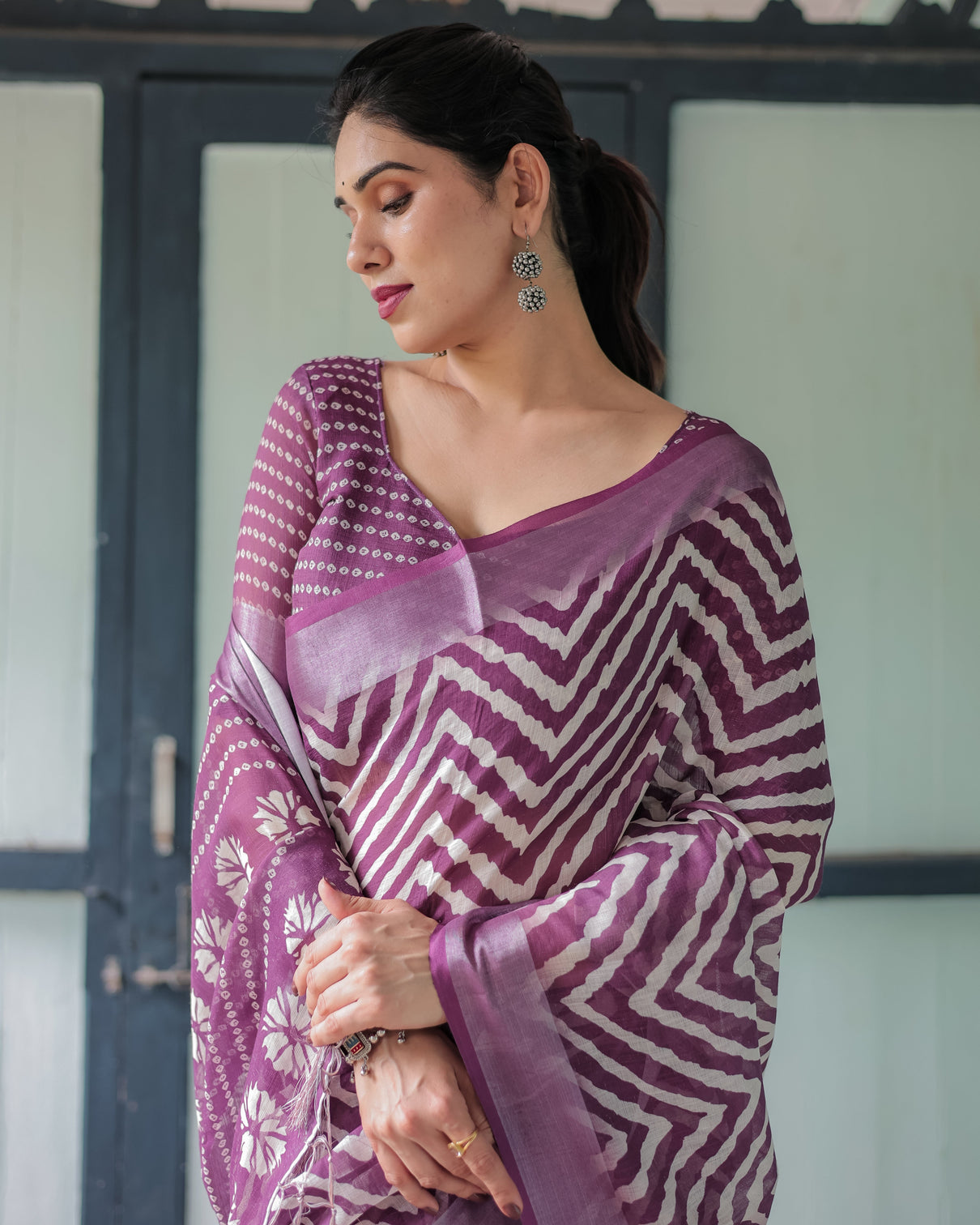 Purple and white zigzag patterned pure cotton linen saree with blouse and tassel edges