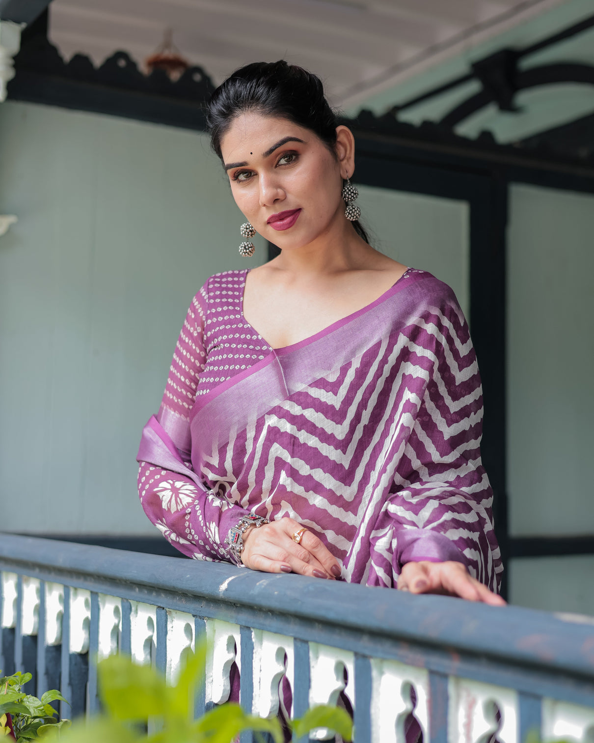 Purple and white zigzag patterned pure cotton linen saree with blouse and tassel edges