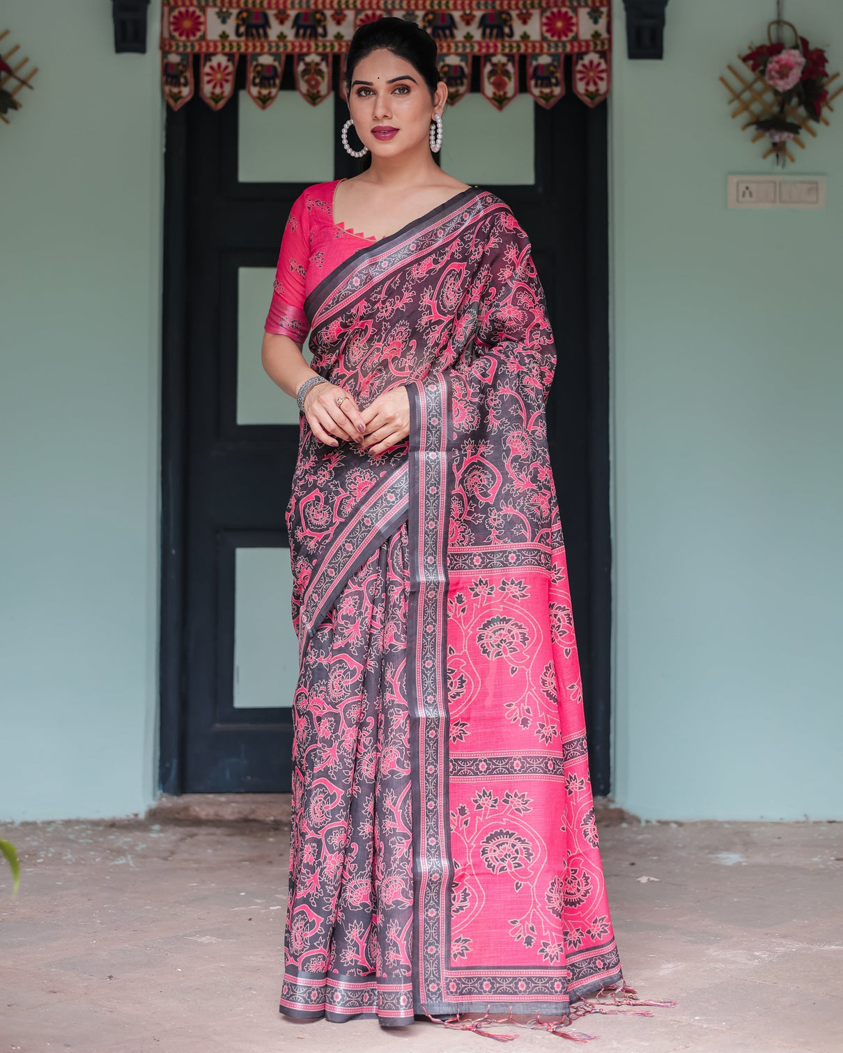 Pure cotton linen saree in black and pink with floral print and tassels mameraa