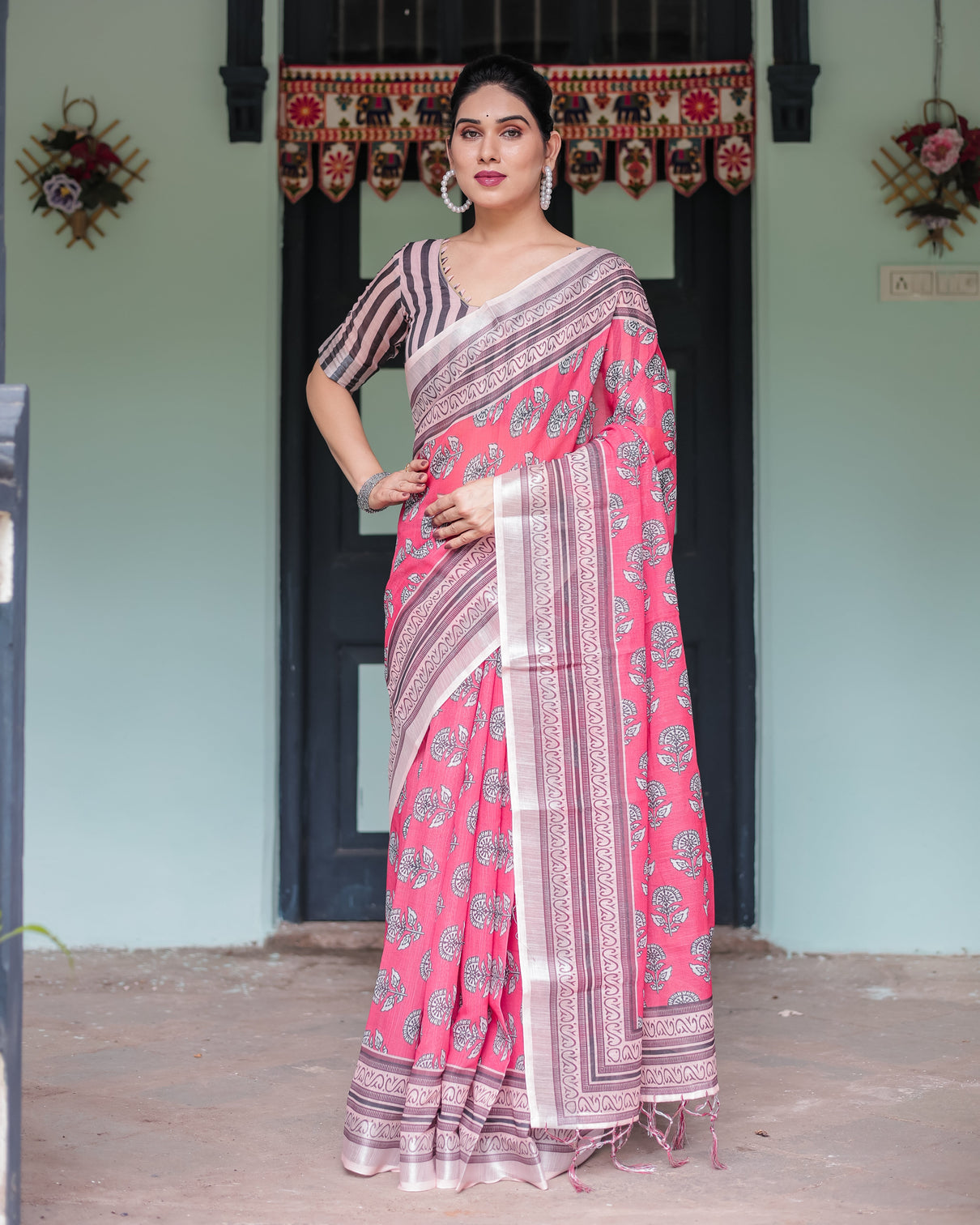 Pink and beige floral printed pure cotton linen saree with striped blouse and tassels on edges