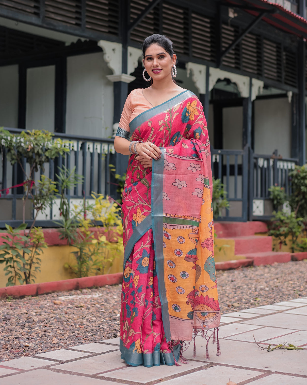 Pink and orange pure cotton linen saree with floral kalamkari print blue border and tassels