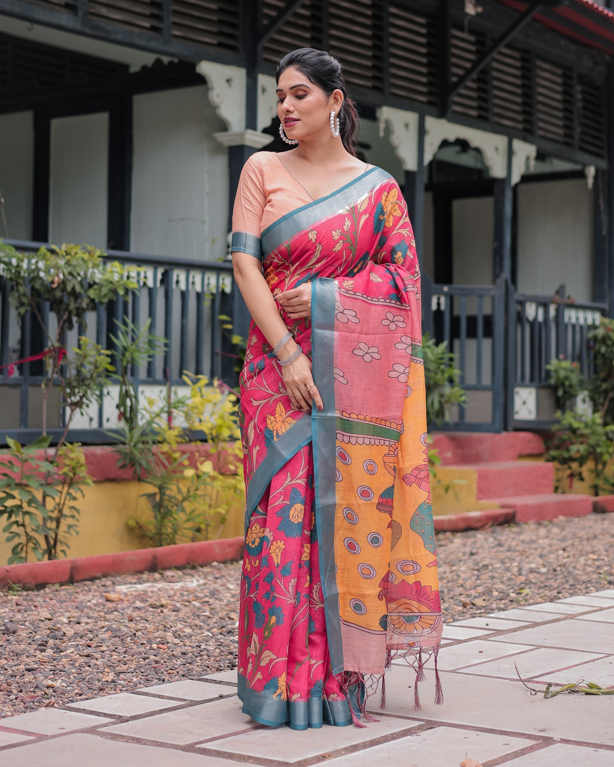 Pink and orange pure cotton linen saree with floral kalamkari print blue border and tassels