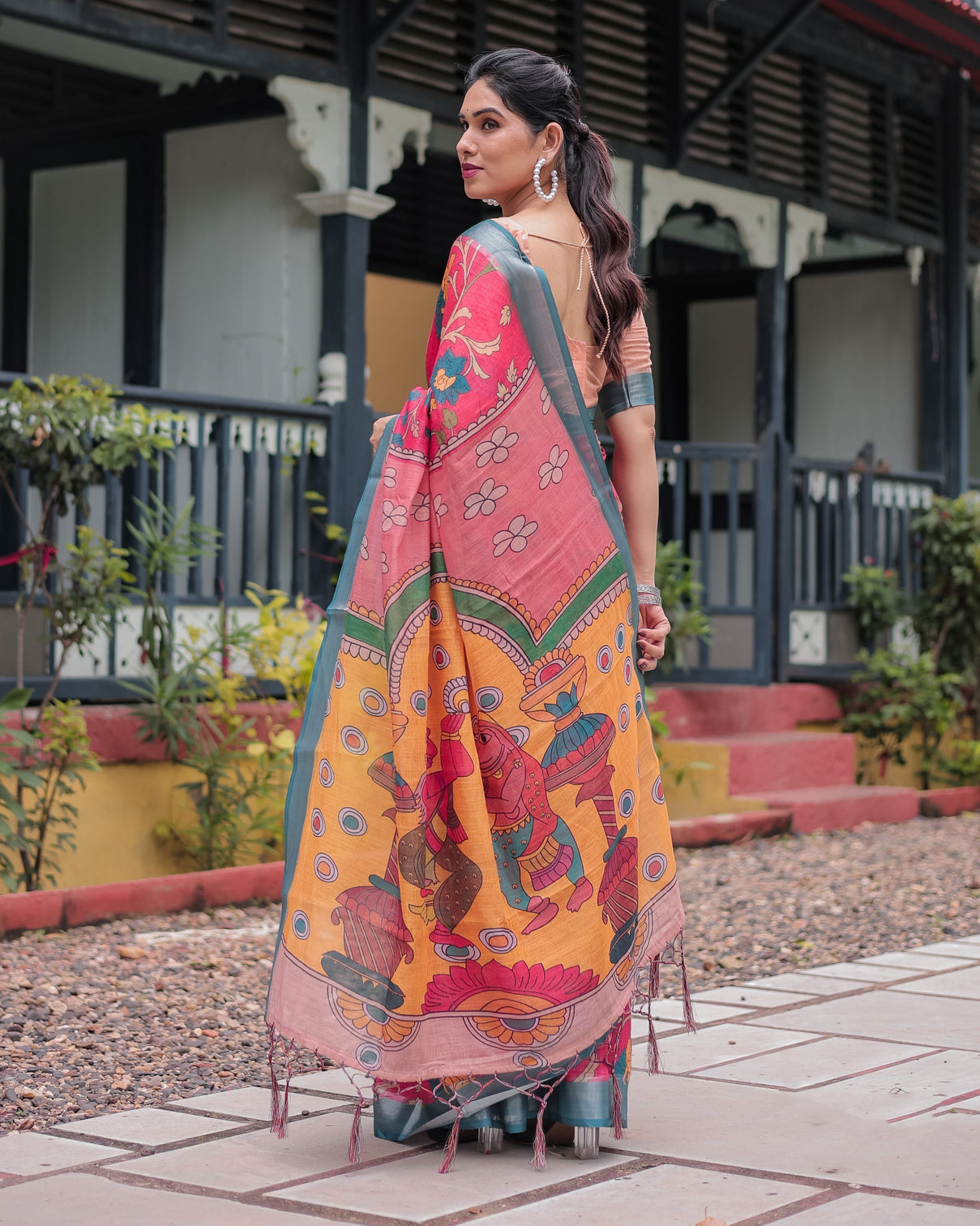 Pink and orange pure cotton linen saree with floral kalamkari print blue border and tassels