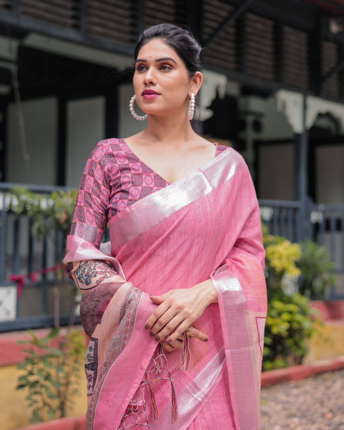 Pink pure cotton linen saree with floral and nature print silver border tassels