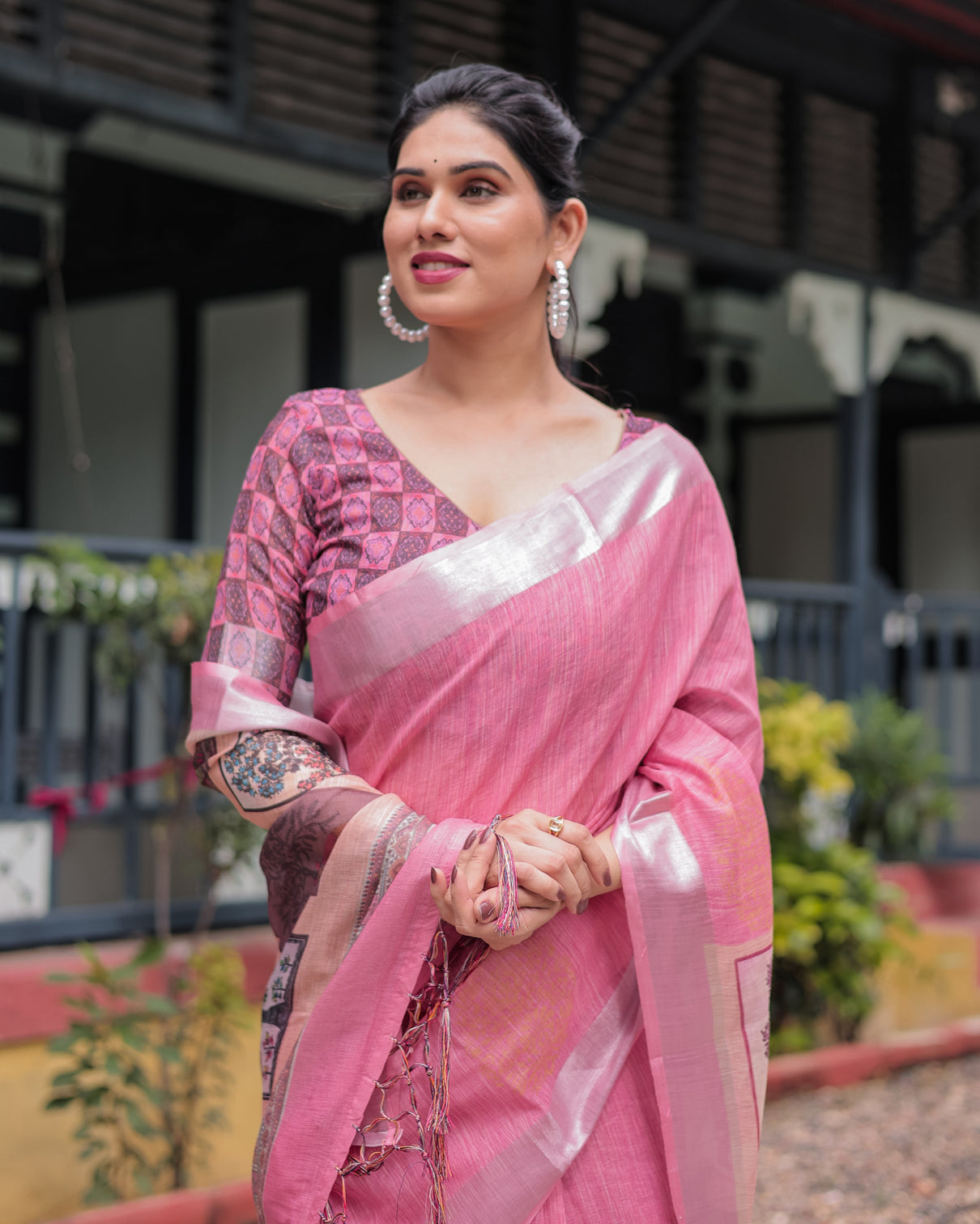 Pink pure cotton linen saree with floral and nature print silver border tassels