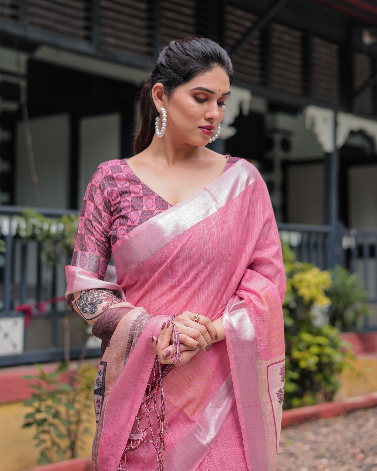 Pink pure cotton linen saree with floral and nature print silver border tassels