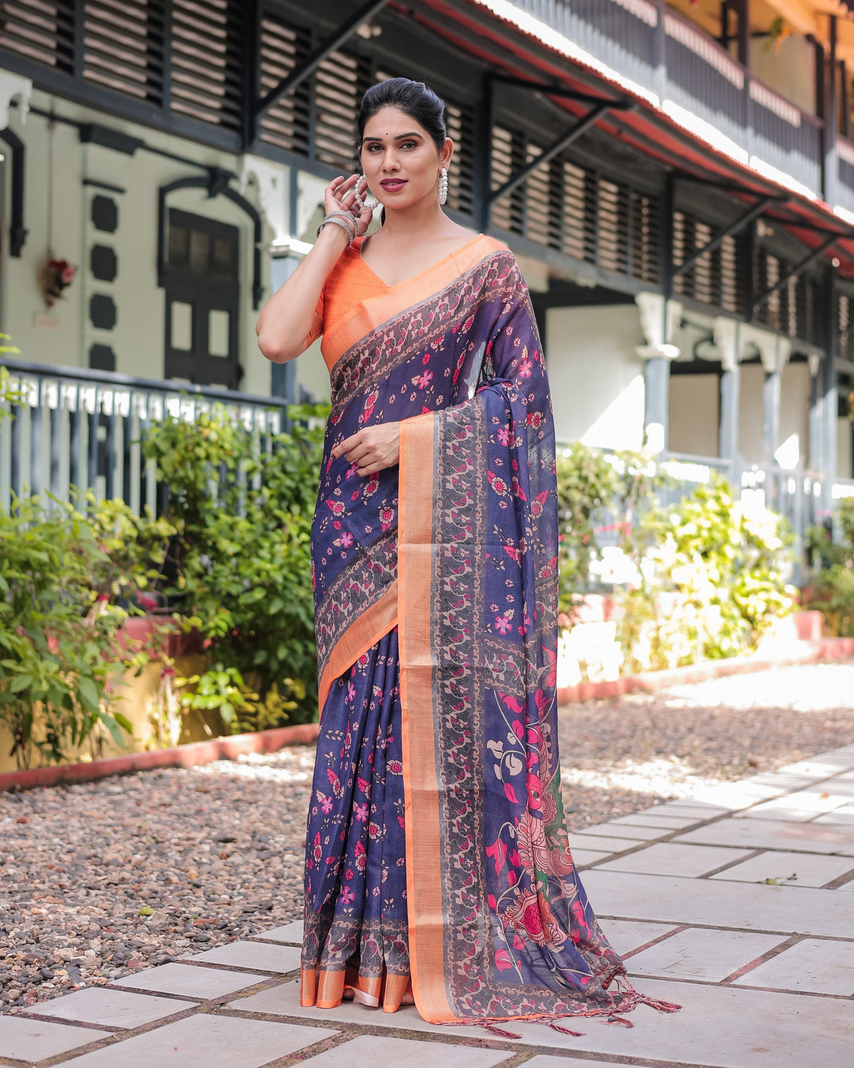 Indigo blue floral print pure cotton linen saree with orange border and tassels