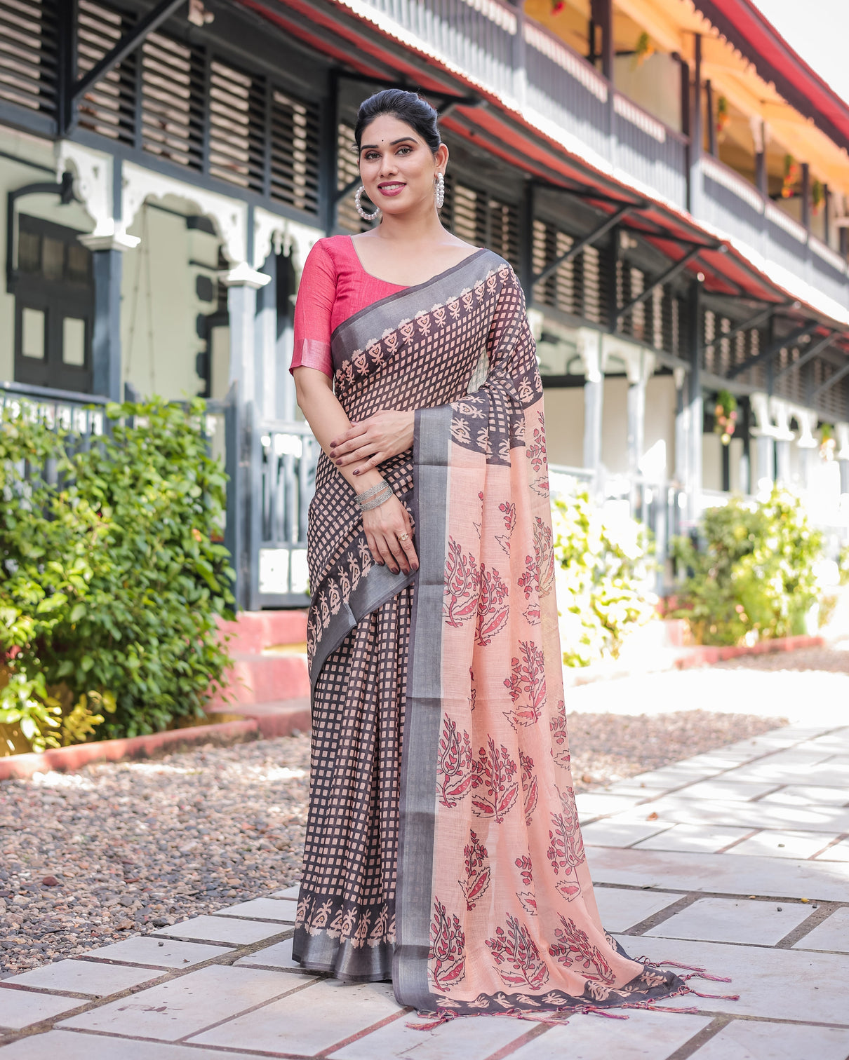 Peach and black floral and geometric design pure cotton linen saree with blouse and tassels