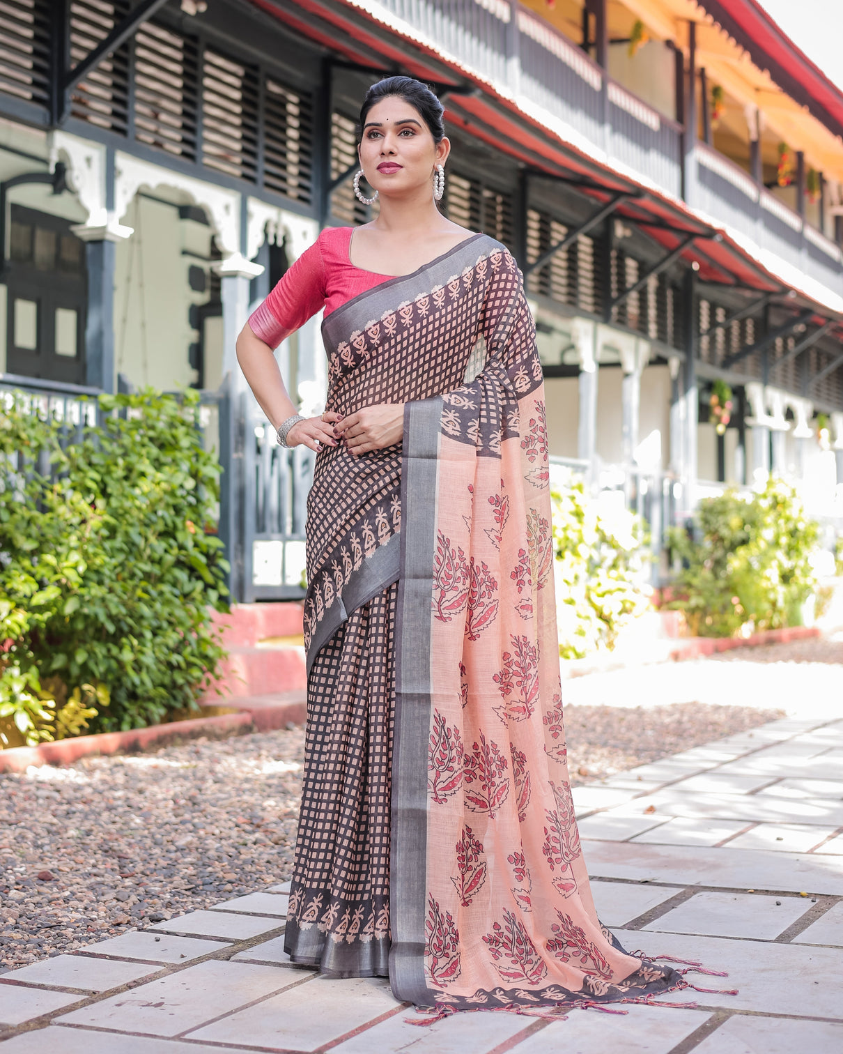 Peach and black floral and geometric design pure cotton linen saree with blouse and tassels