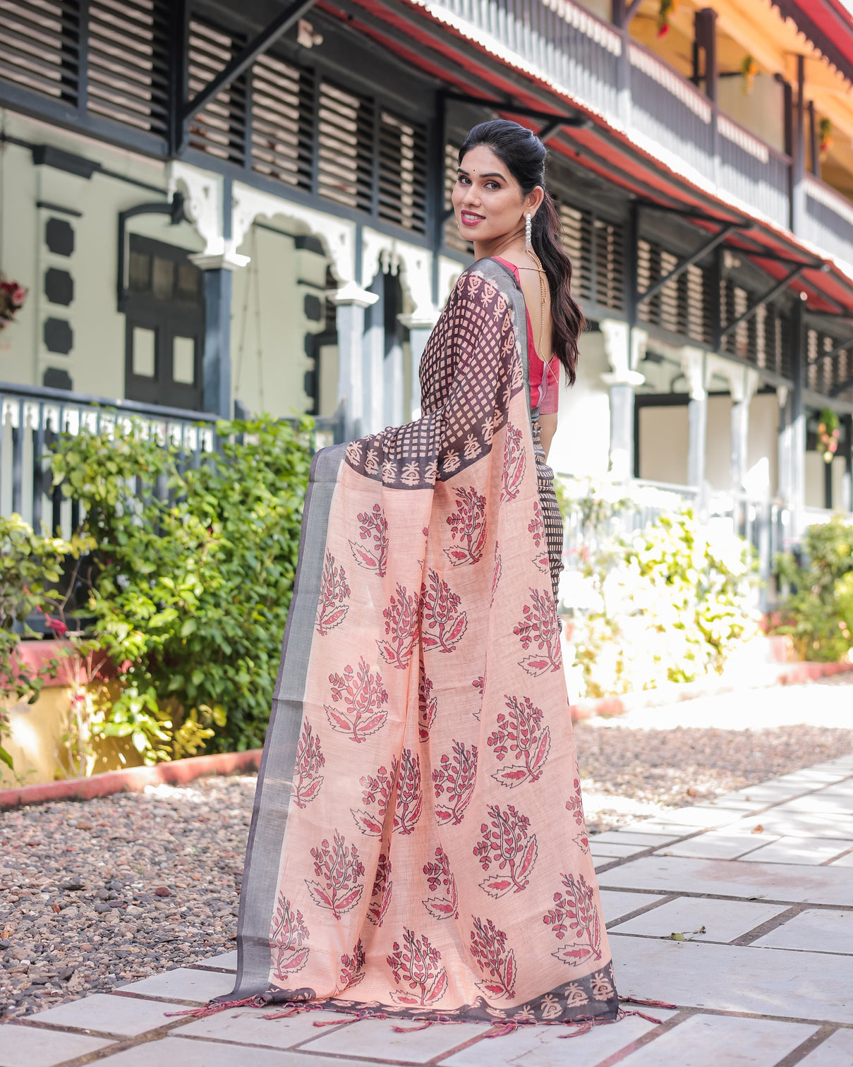 Peach and black floral and geometric design pure cotton linen saree with blouse and tassels