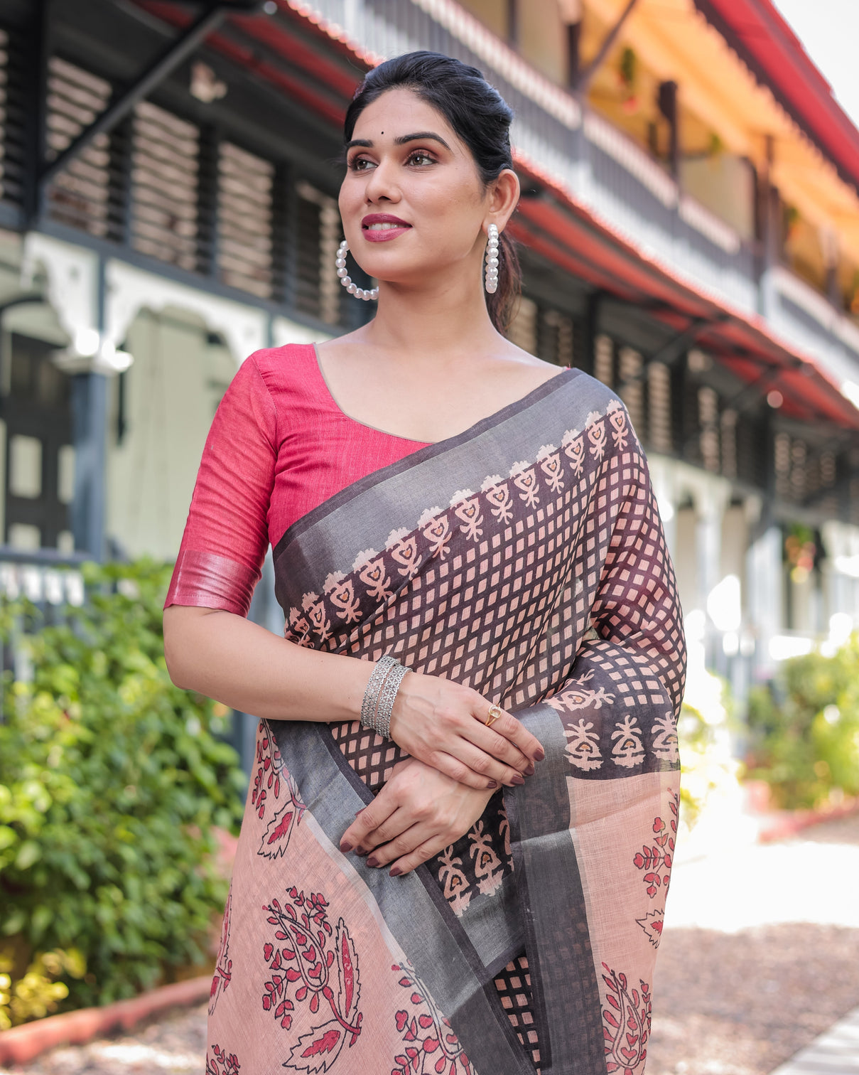 Peach and black floral and geometric design pure cotton linen saree with blouse and tassels