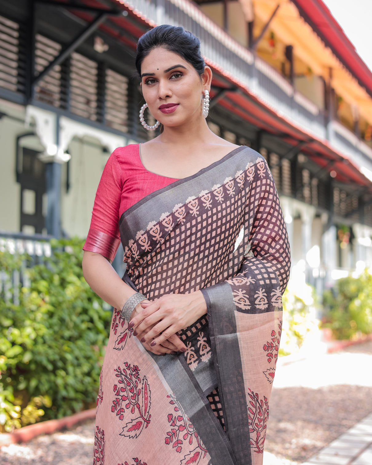 Peach and black floral and geometric design pure cotton linen saree with blouse and tassels