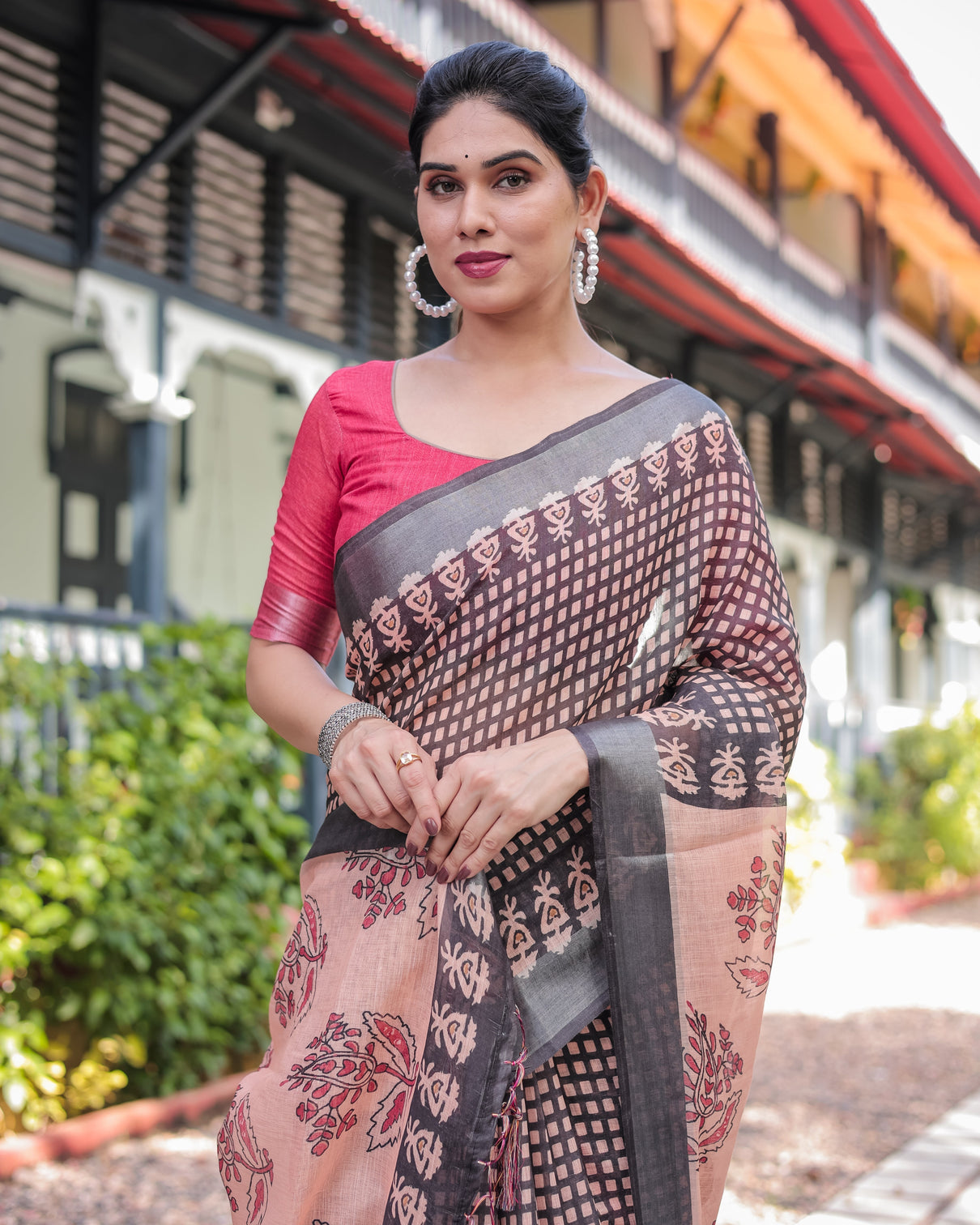 Peach and black floral and geometric design pure cotton linen saree with blouse and tassels
