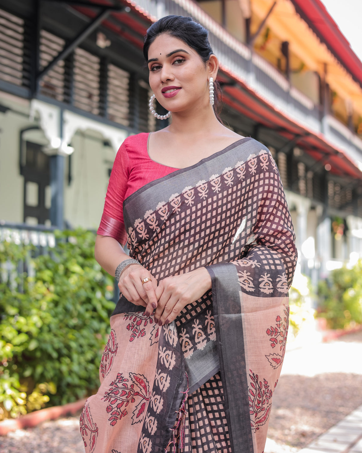 Peach and black floral and geometric design pure cotton linen saree with blouse and tassels