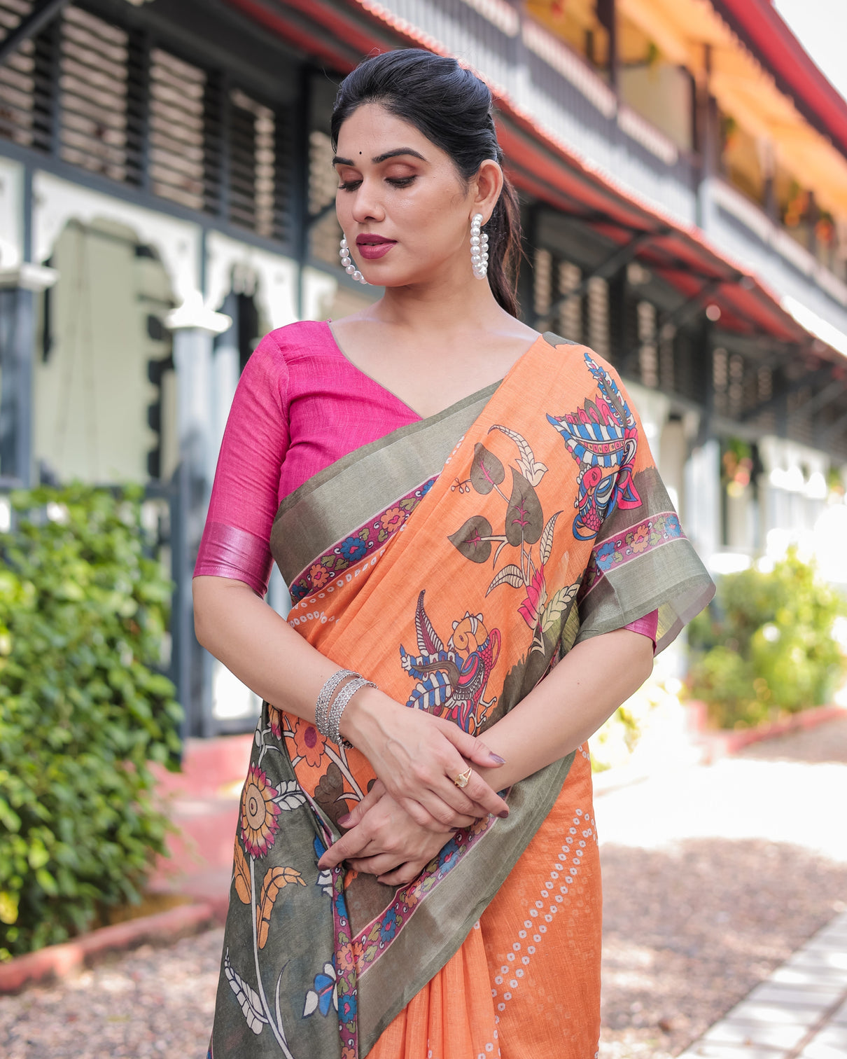 Orange and olive green kalamkari design pure cotton linen saree with blouse and tassels