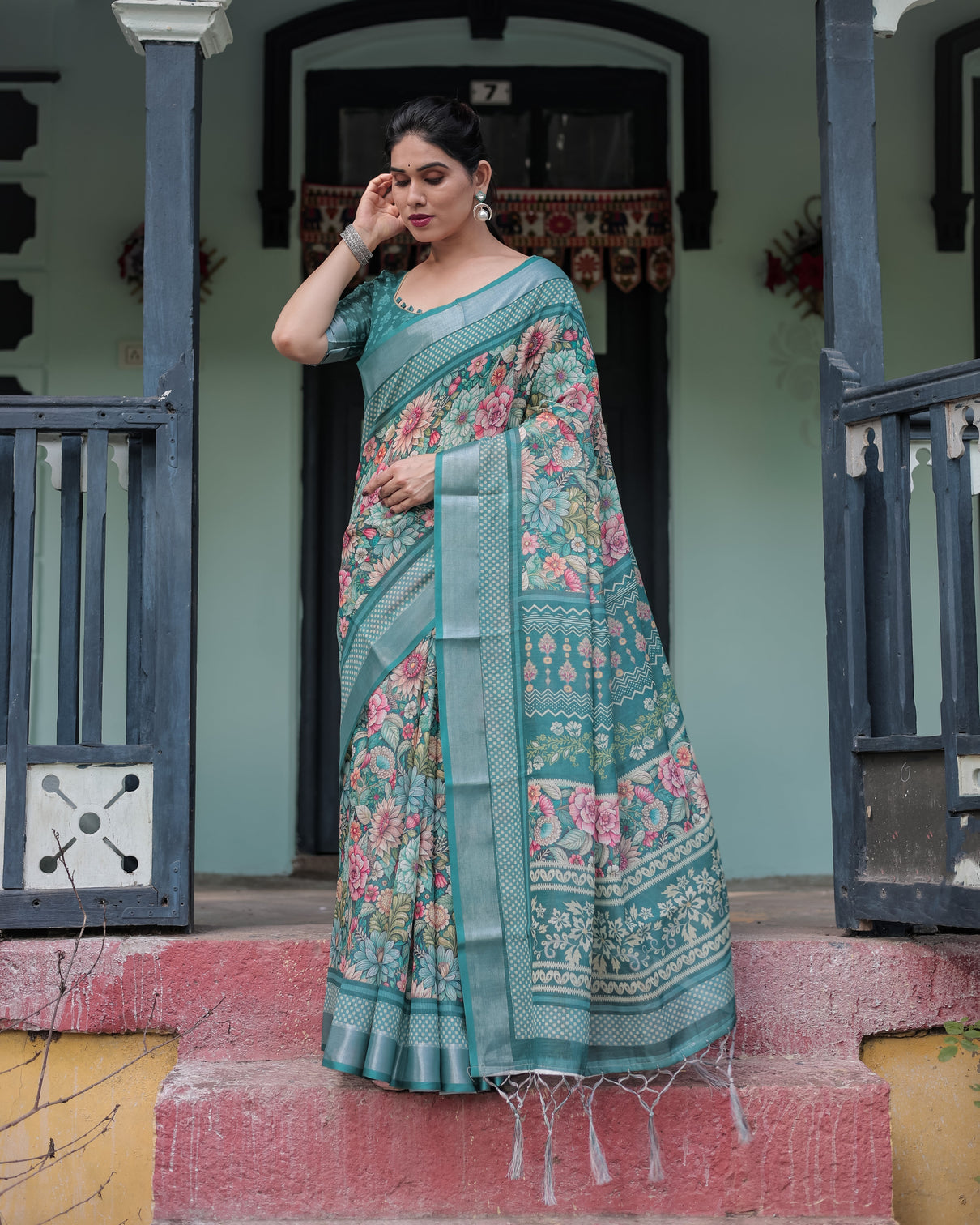 Teal green floral printed pure cotton linen saree with blouse and tassels on edges