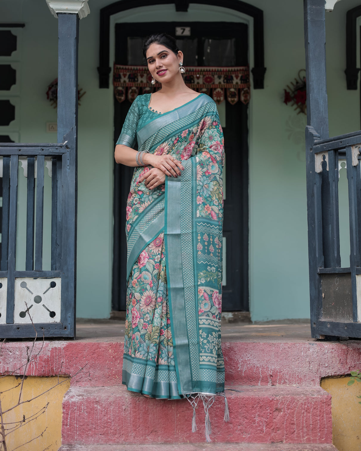 Teal green floral printed pure cotton linen saree with blouse and tassels on edges