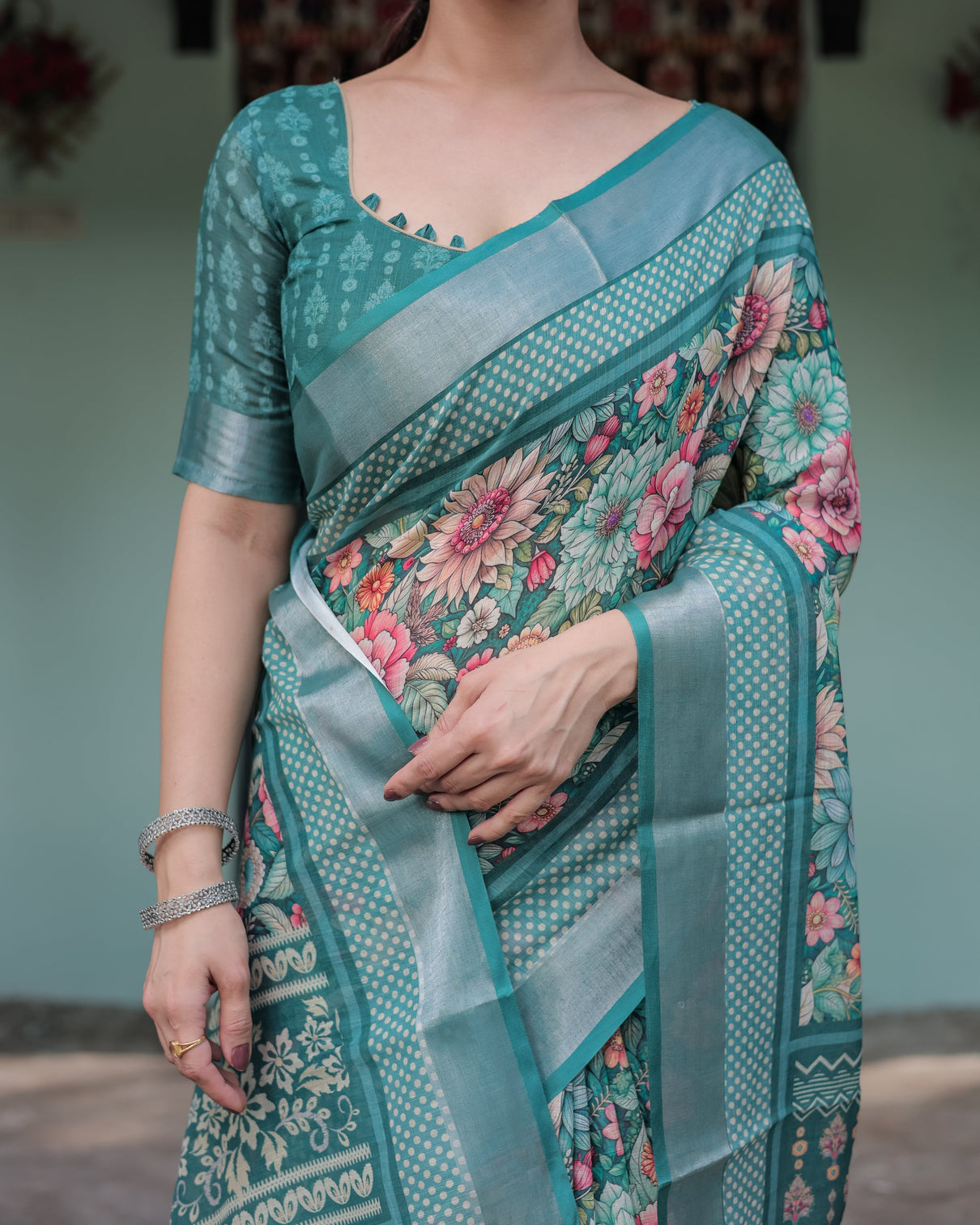 Teal green floral printed pure cotton linen saree with blouse and tassels on edges