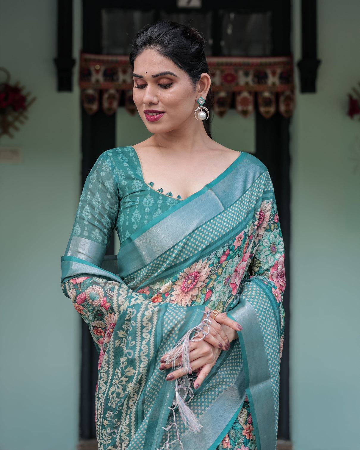 Teal green floral printed pure cotton linen saree with blouse and tassels on edges