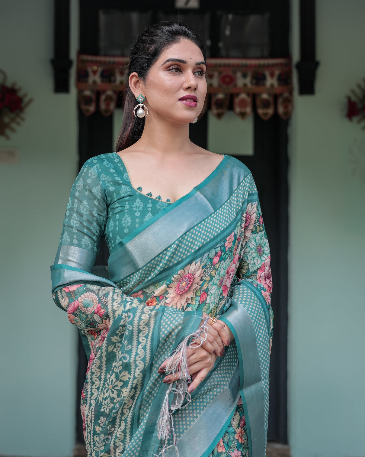 Teal green floral printed pure cotton linen saree with blouse and tassels on edges