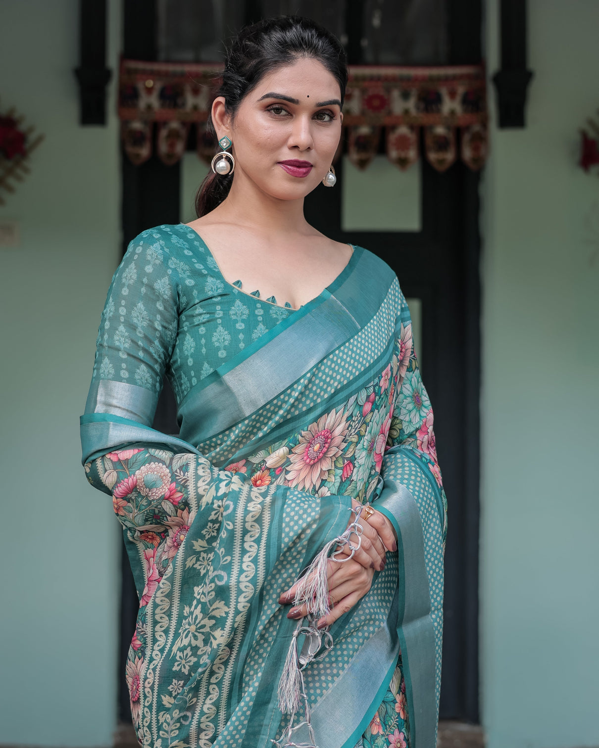 Teal green floral printed pure cotton linen saree with blouse and tassels on edges