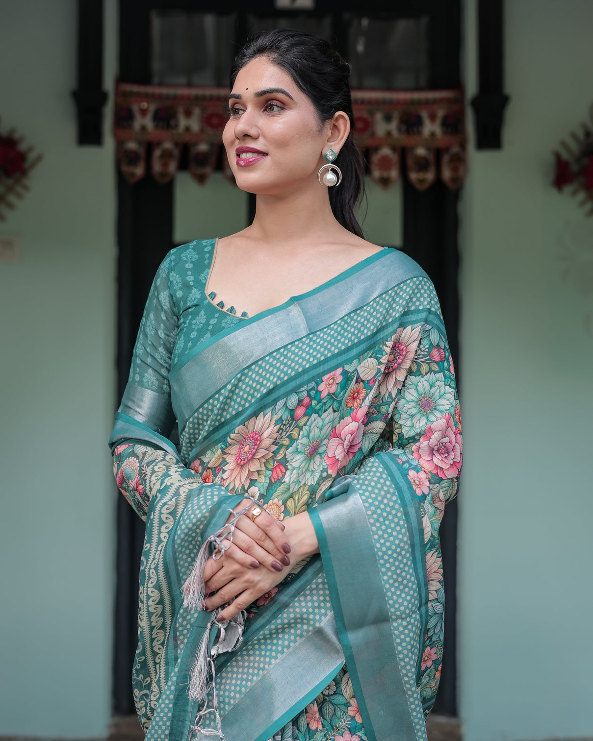 Teal green floral printed pure cotton linen saree with blouse and tassels on edges