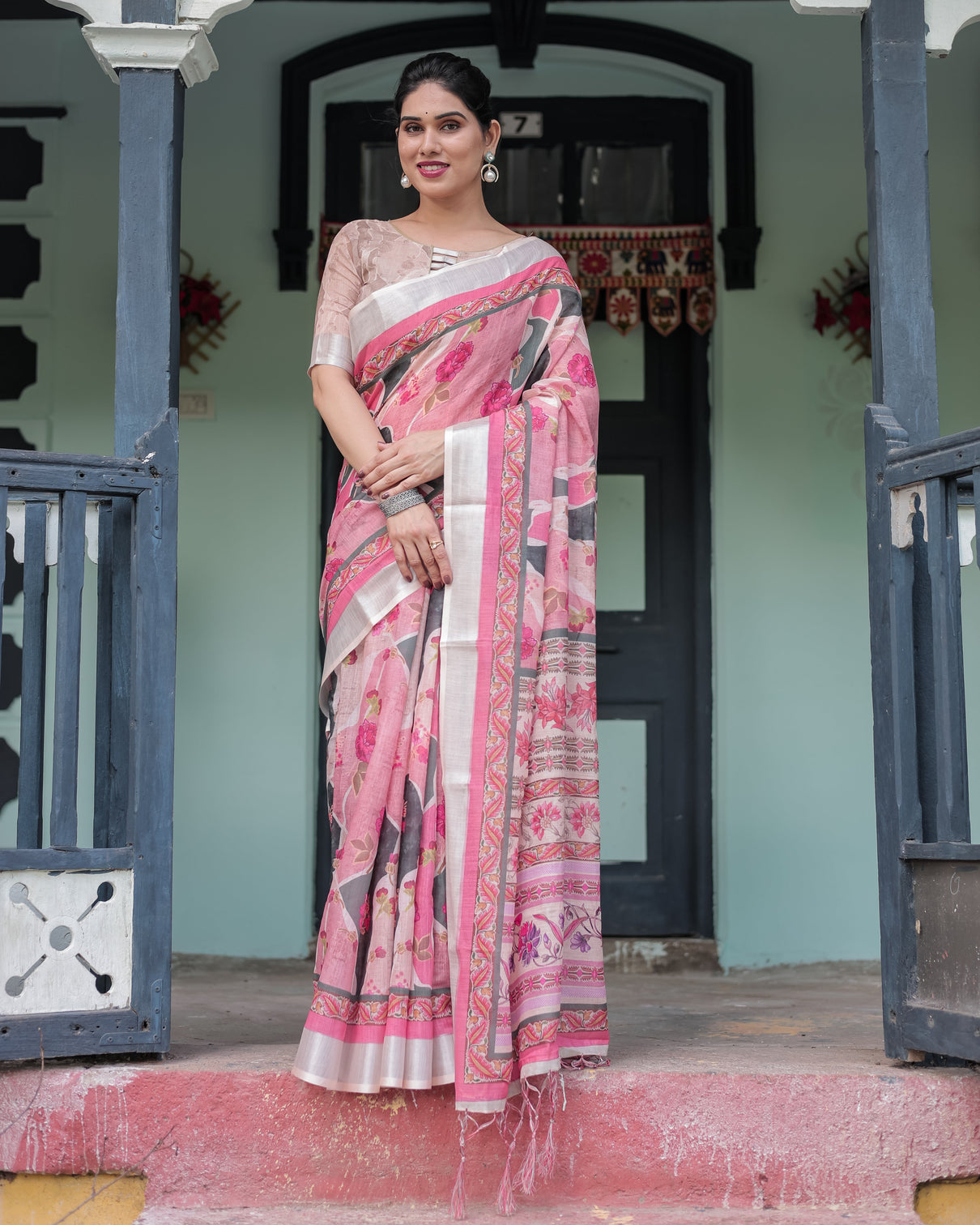 Elegant pink and white pure cotton linen saree with floral and foliage prints contrast border and tassels mameraa