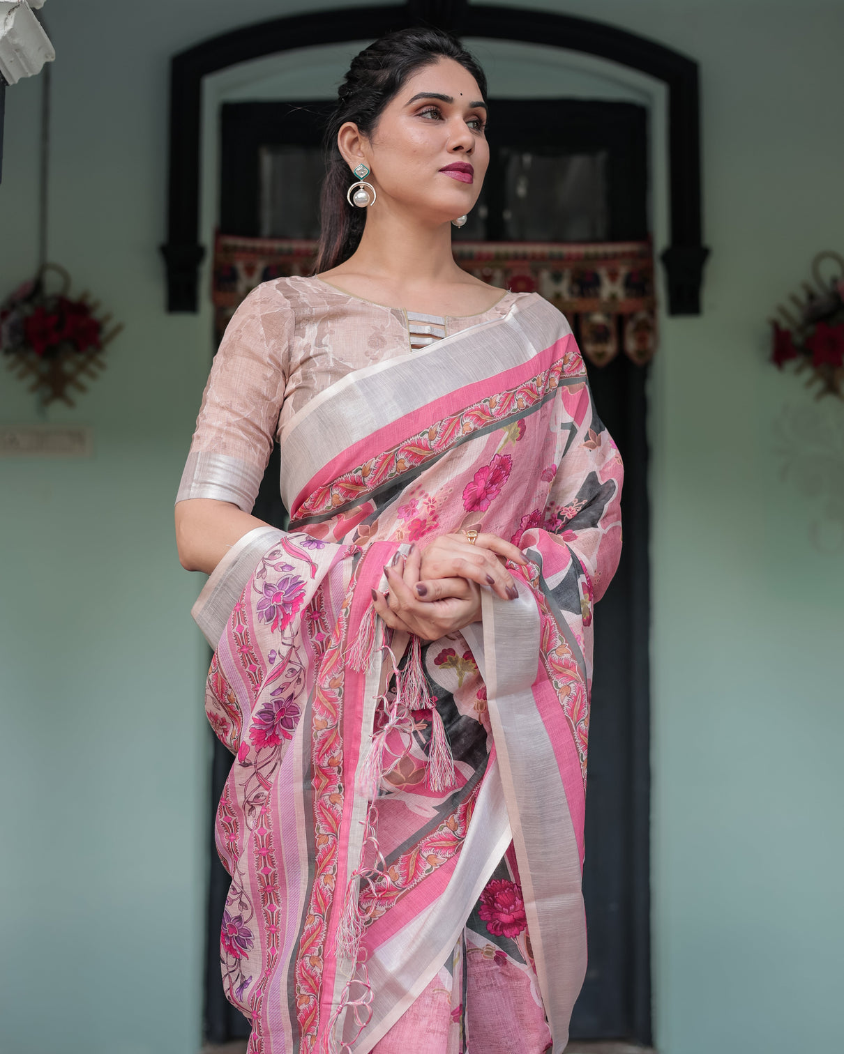 Elegant pink and white pure cotton linen saree with floral and foliage prints contrast border and tassels