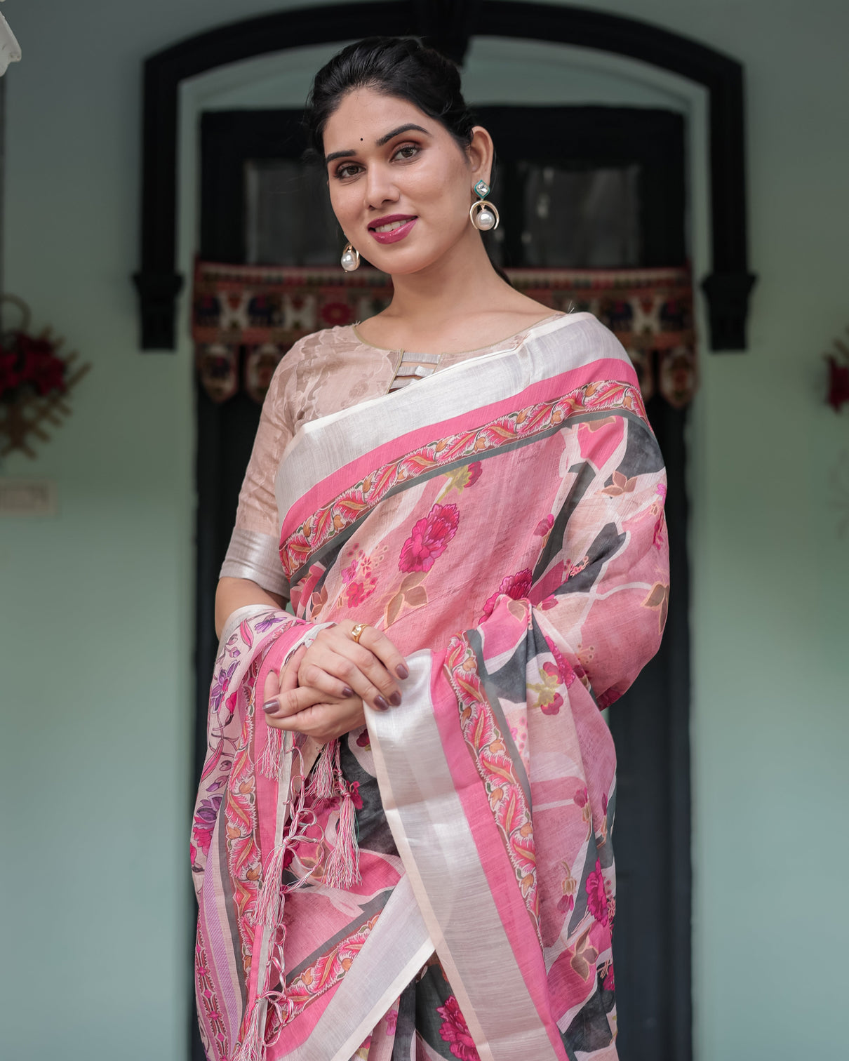 Elegant pink and white pure cotton linen saree with floral and foliage prints contrast border and tassels