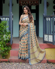 Beige and charcoal pure cotton linen saree with floral print blouse and tassel detailing mameraa