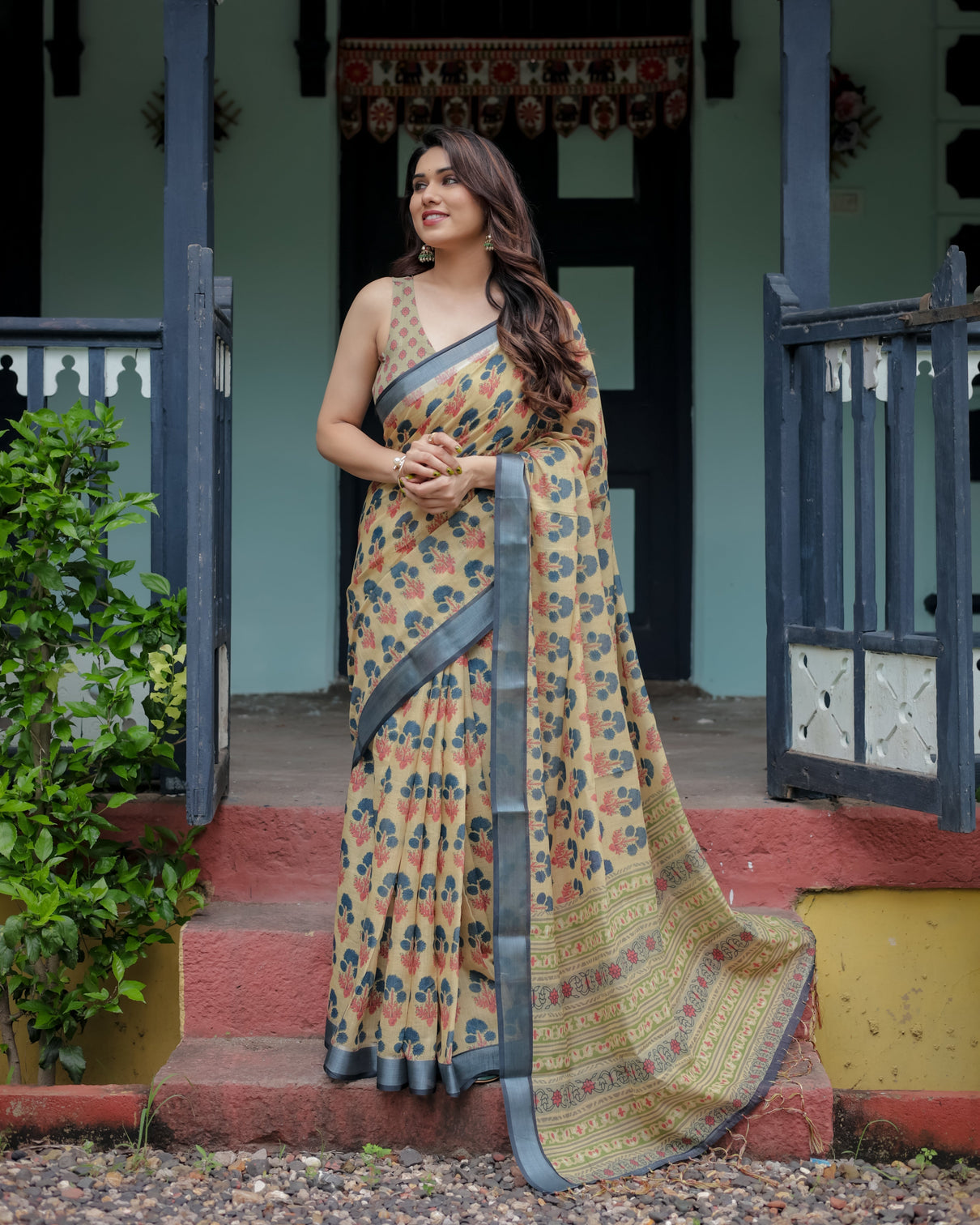 Beige and charcoal pure cotton linen saree with floral print blouse and tassel detailing