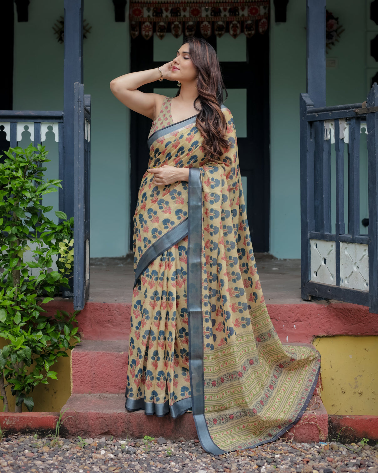 Beige and charcoal pure cotton linen saree with floral print blouse and tassel detailing