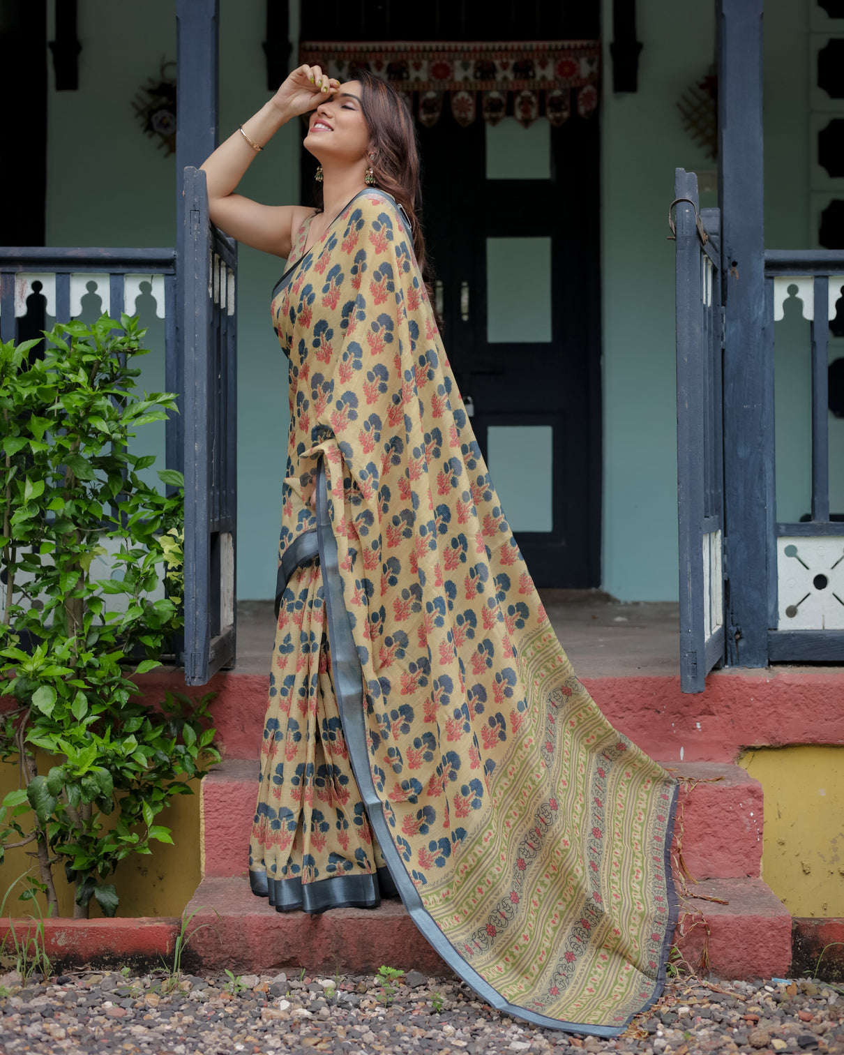 Beige and charcoal pure cotton linen saree with floral print blouse and tassel detailing