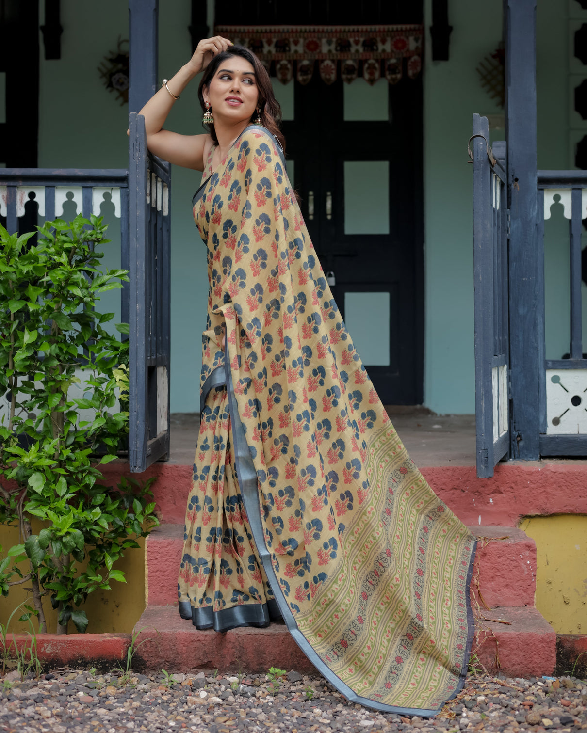 Beige and charcoal pure cotton linen saree with floral print blouse and tassel detailing