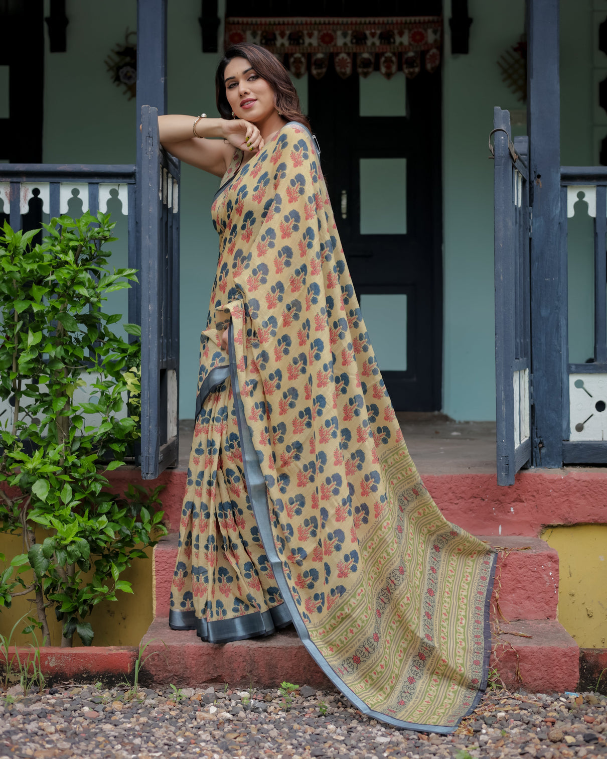 Beige and charcoal pure cotton linen saree with floral print blouse and tassel detailing