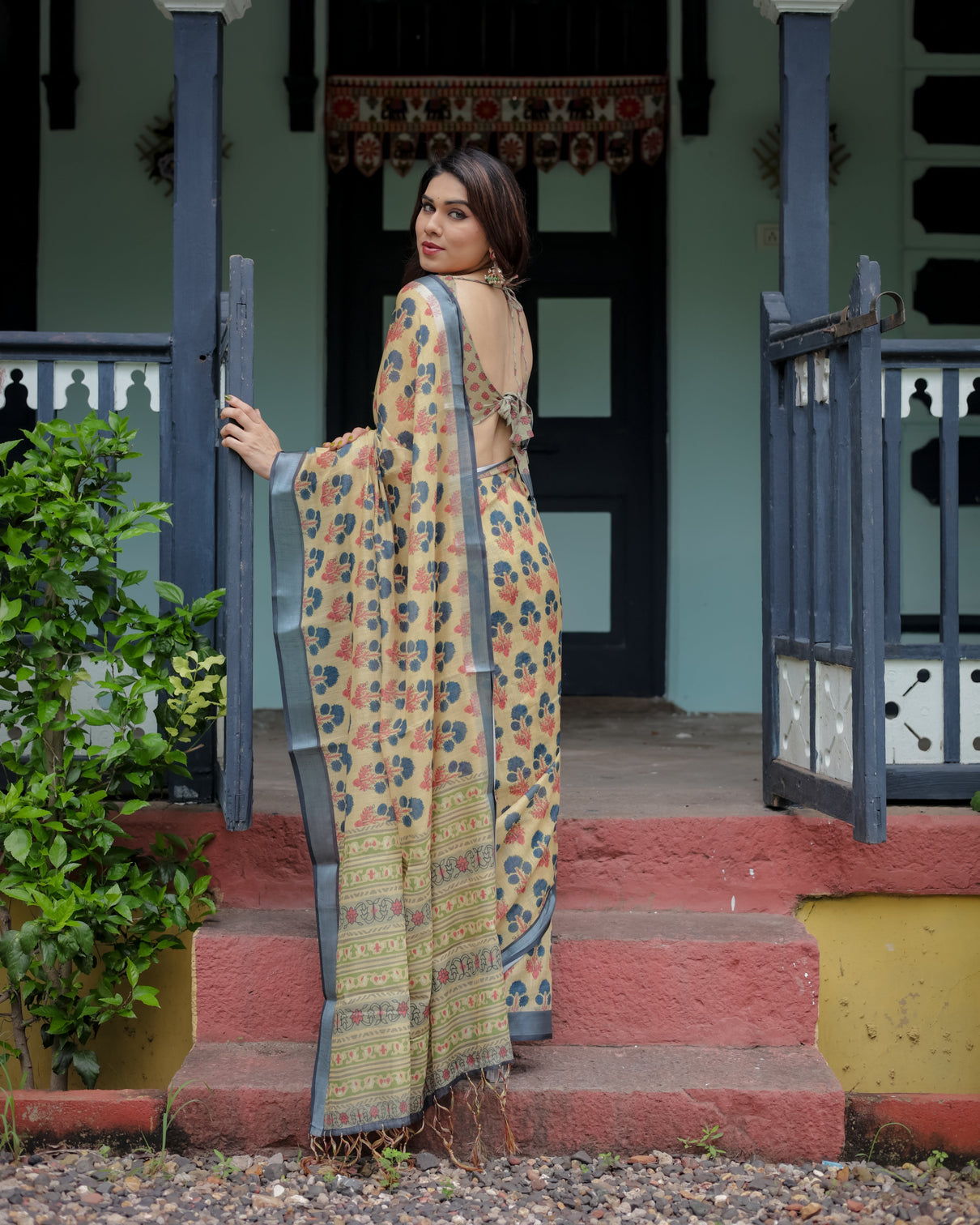 Beige and charcoal pure cotton linen saree with floral print blouse and tassel detailing