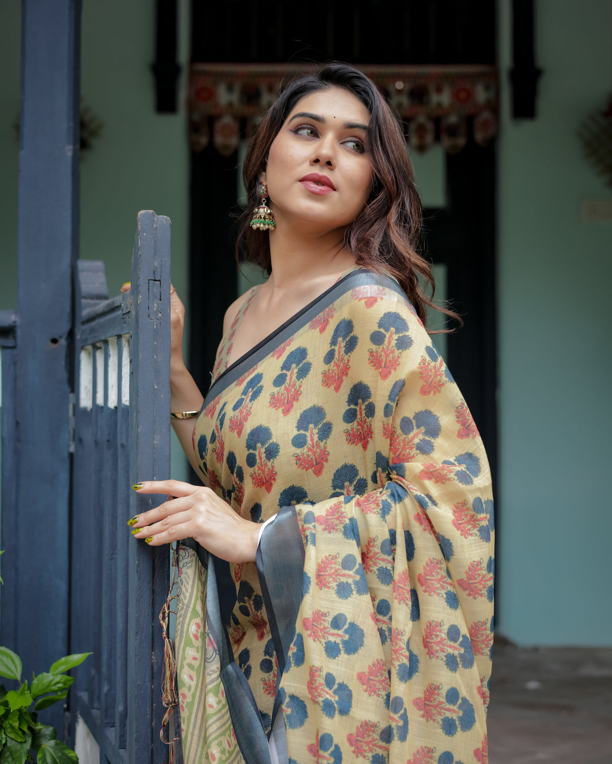 Beige and charcoal pure cotton linen saree with floral print blouse and tassel detailing