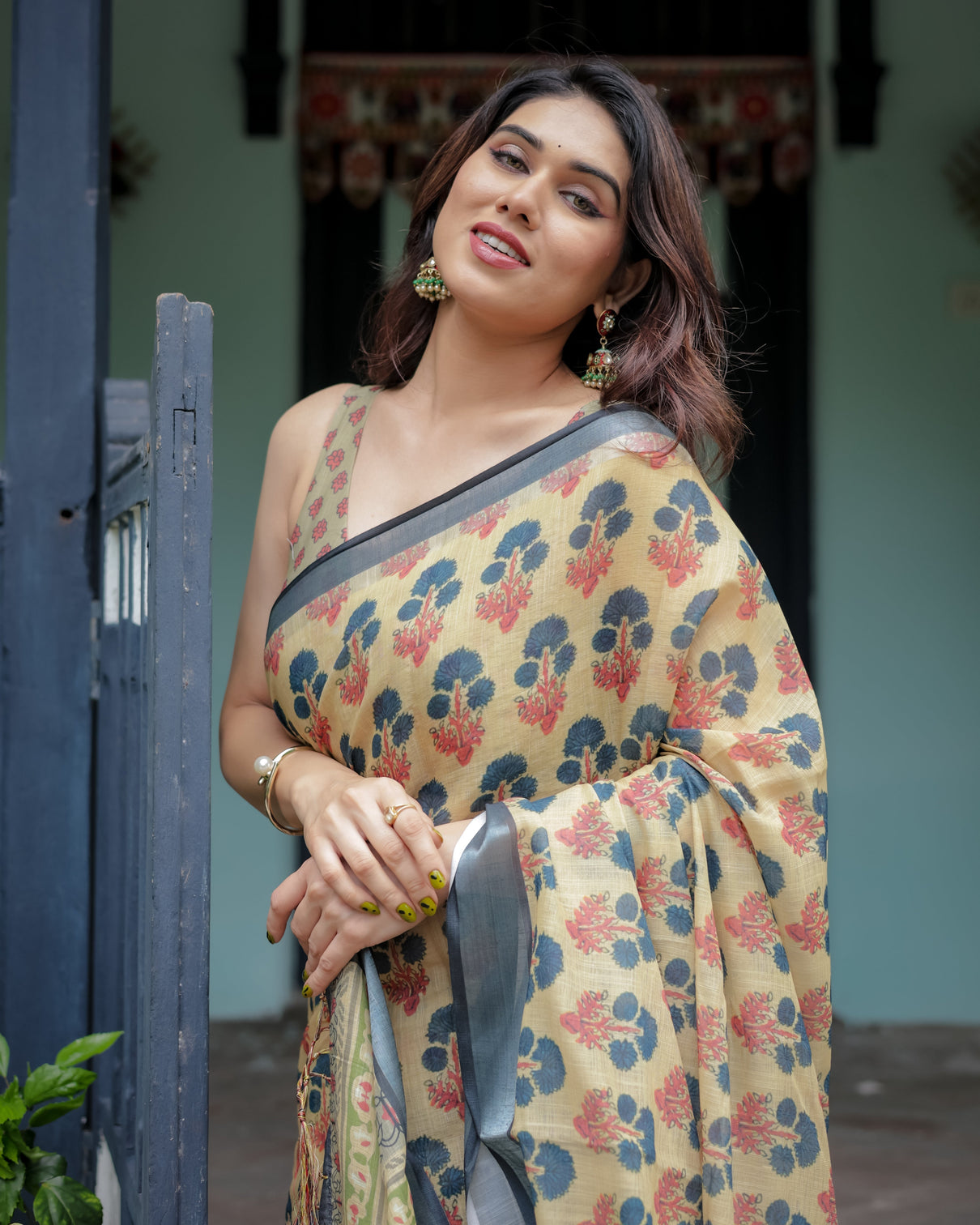 Beige and charcoal pure cotton linen saree with floral print blouse and tassel detailing