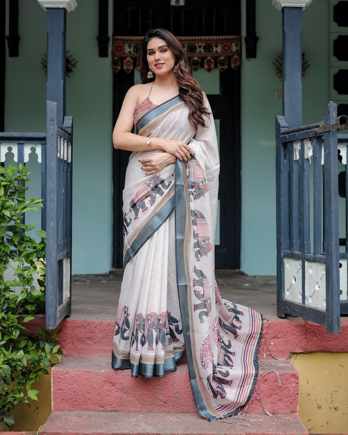 Ivory pure cotton linen saree with elephant motif and tassel detailing mameraa