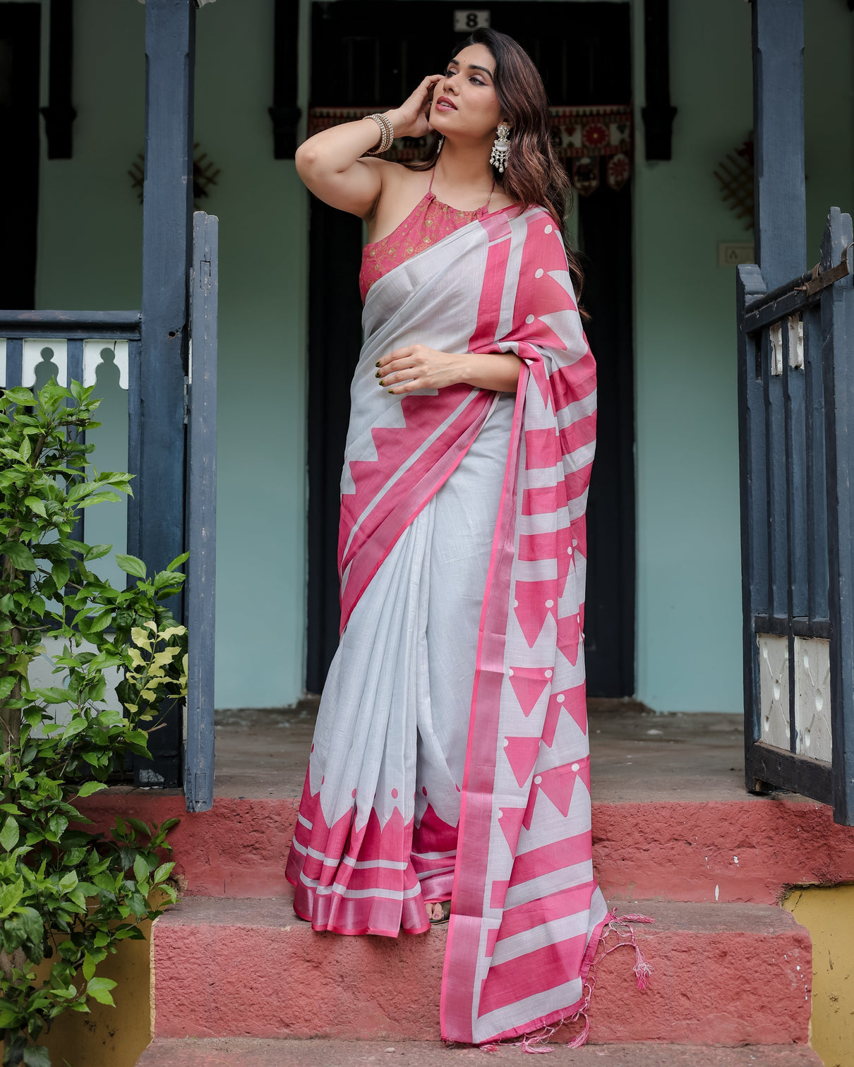 White and pink pure cotton linen saree with geometric stripes blouse and tassel detailing