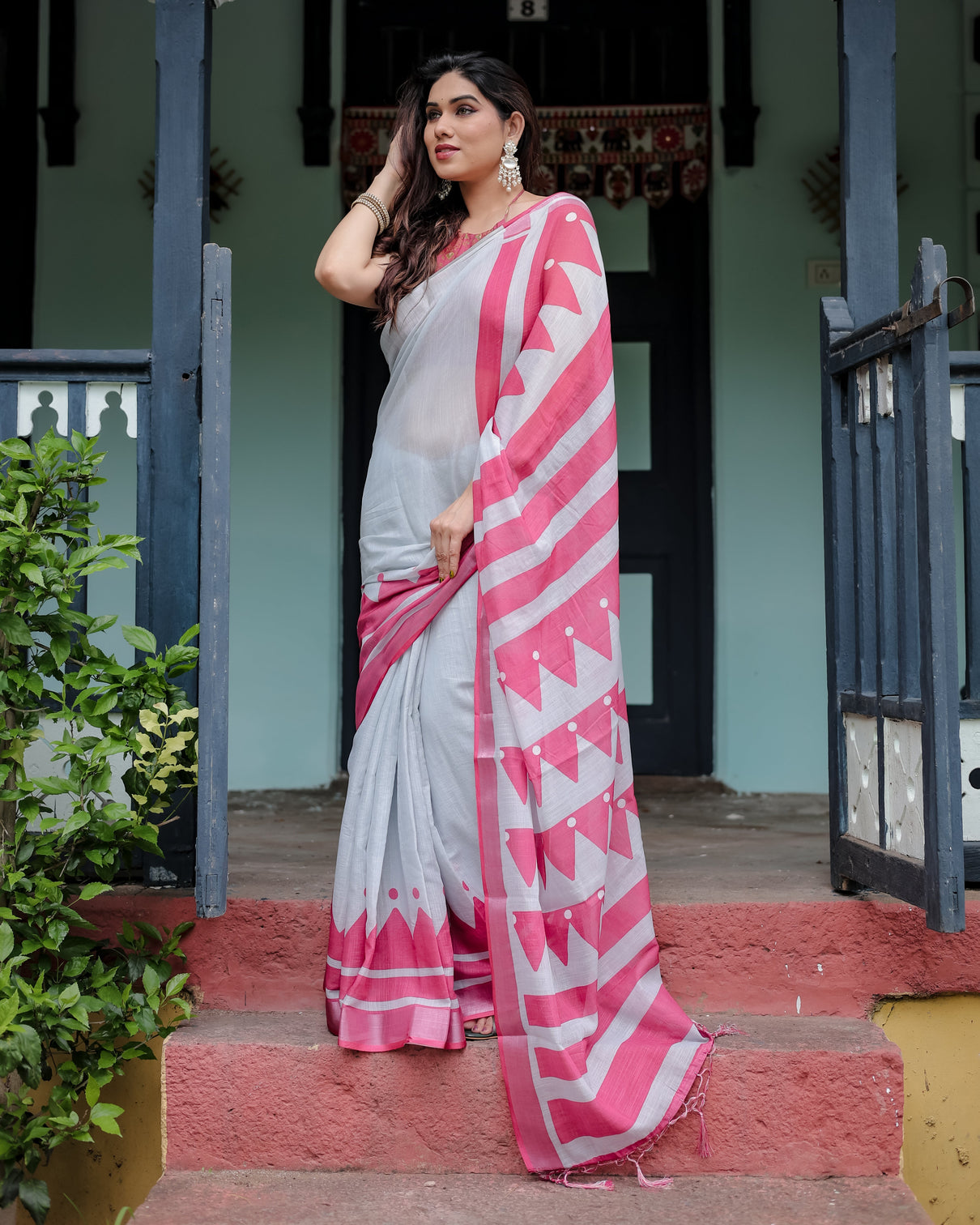 White and pink pure cotton linen saree with geometric stripes blouse and tassel detailing