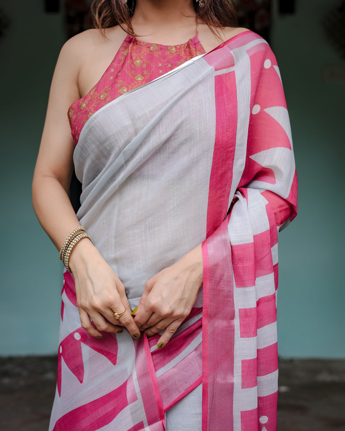 White and pink pure cotton linen saree with geometric stripes blouse and tassel detailing