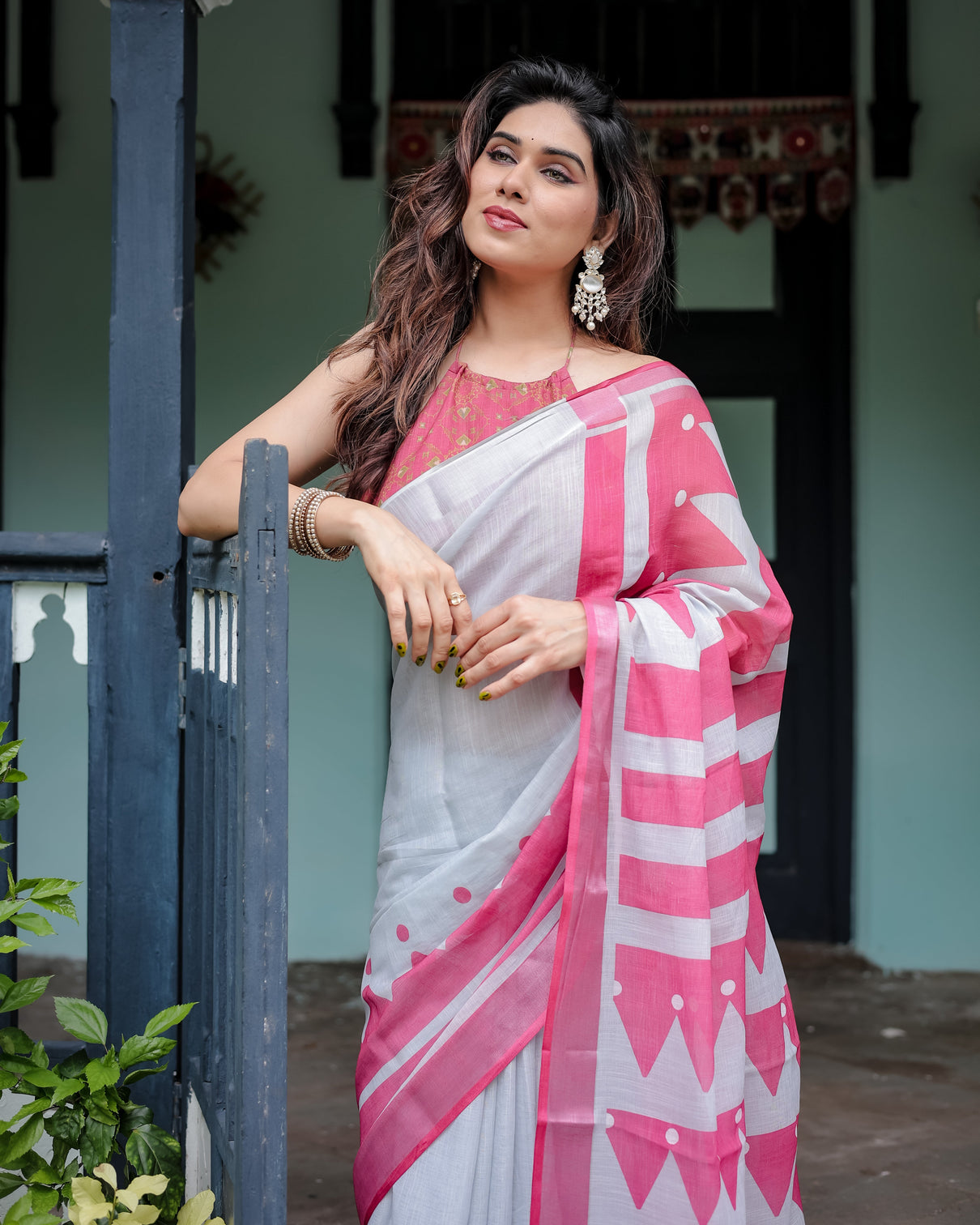 White and pink pure cotton linen saree with geometric stripes blouse and tassel detailing