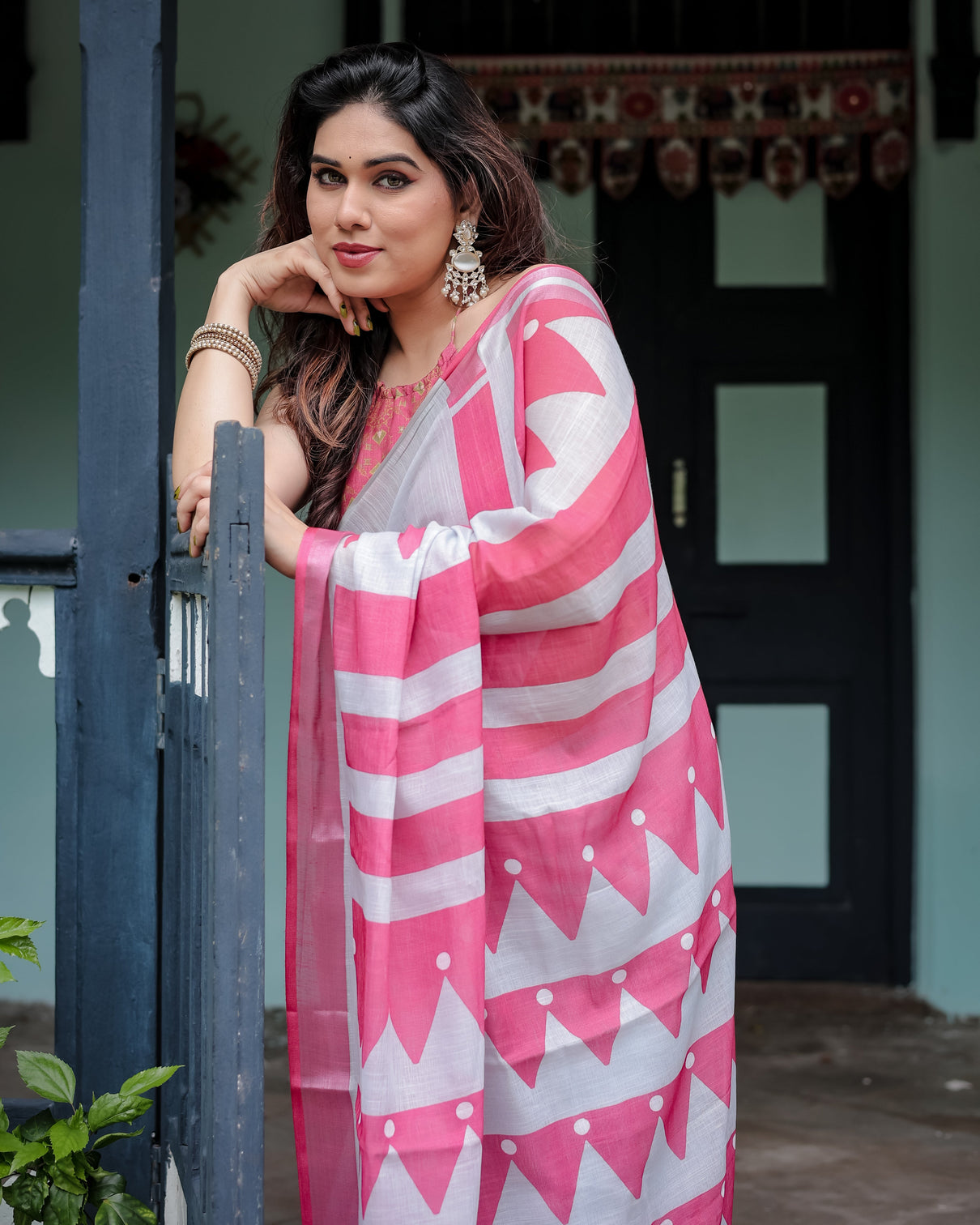 White and pink pure cotton linen saree with geometric stripes blouse and tassel detailing