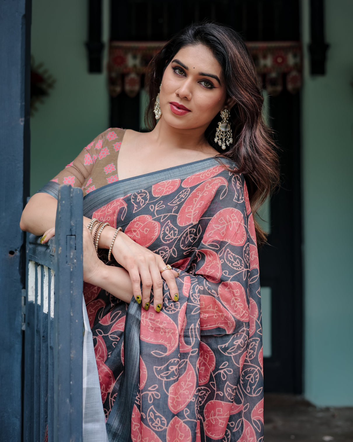 Charcoal black pure cotton linen saree with leafy paisley print blouse and tassel detailing