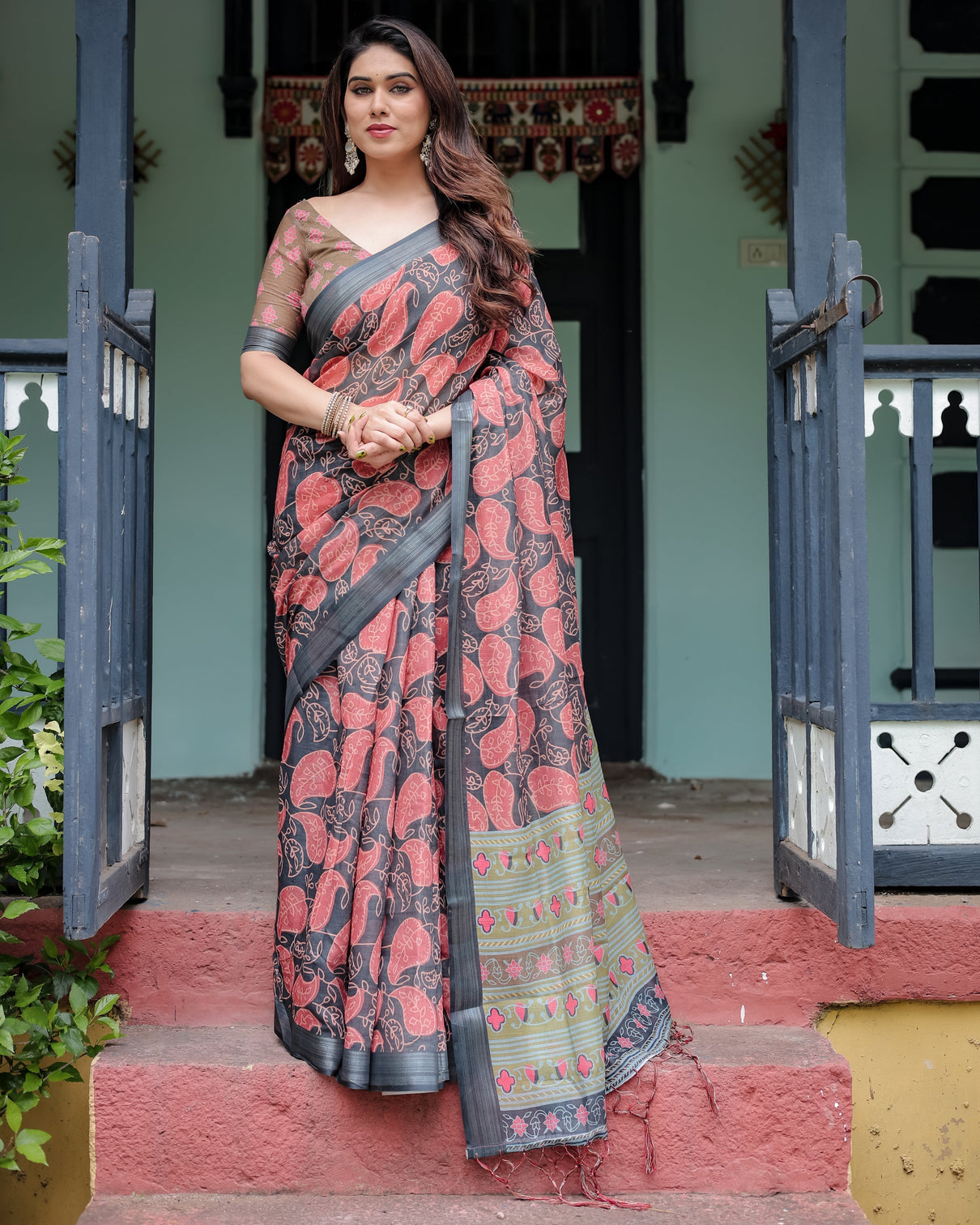 Charcoal black pure cotton linen saree with leafy paisley print blouse and tassel detailing mameraa