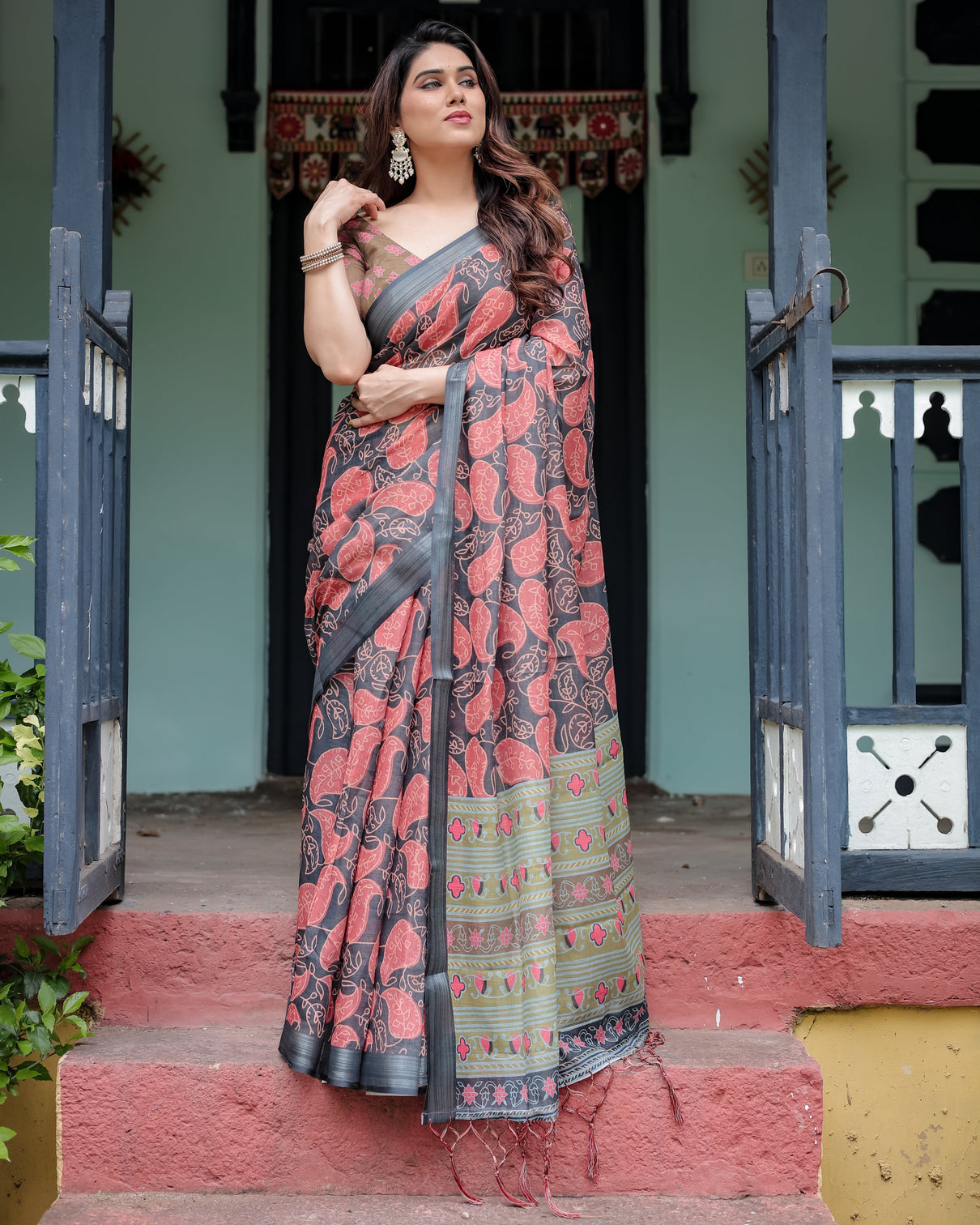 Charcoal black pure cotton linen saree with leafy paisley print blouse and tassel detailing