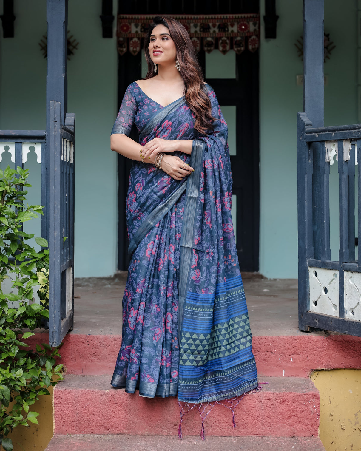 Navy blue pure cotton linen saree with floral print blouse and tassel detailing