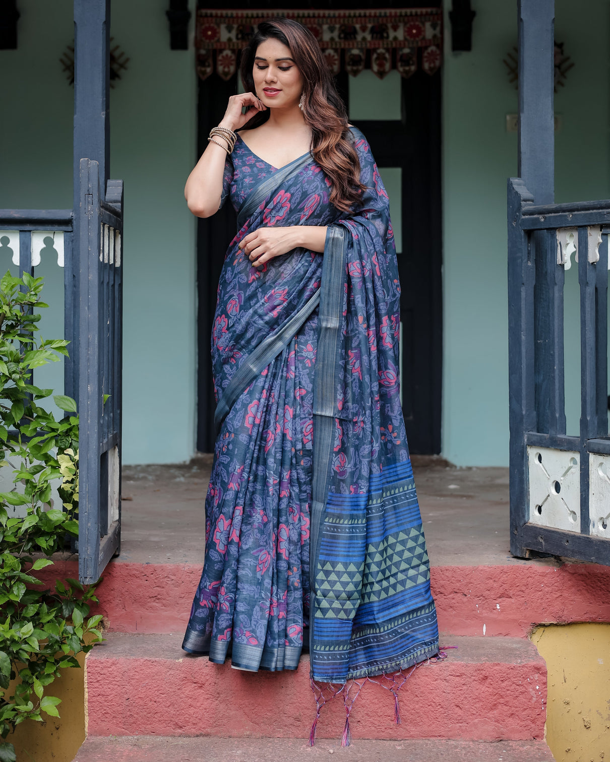 Navy blue pure cotton linen saree with floral print blouse and tassel detailing
