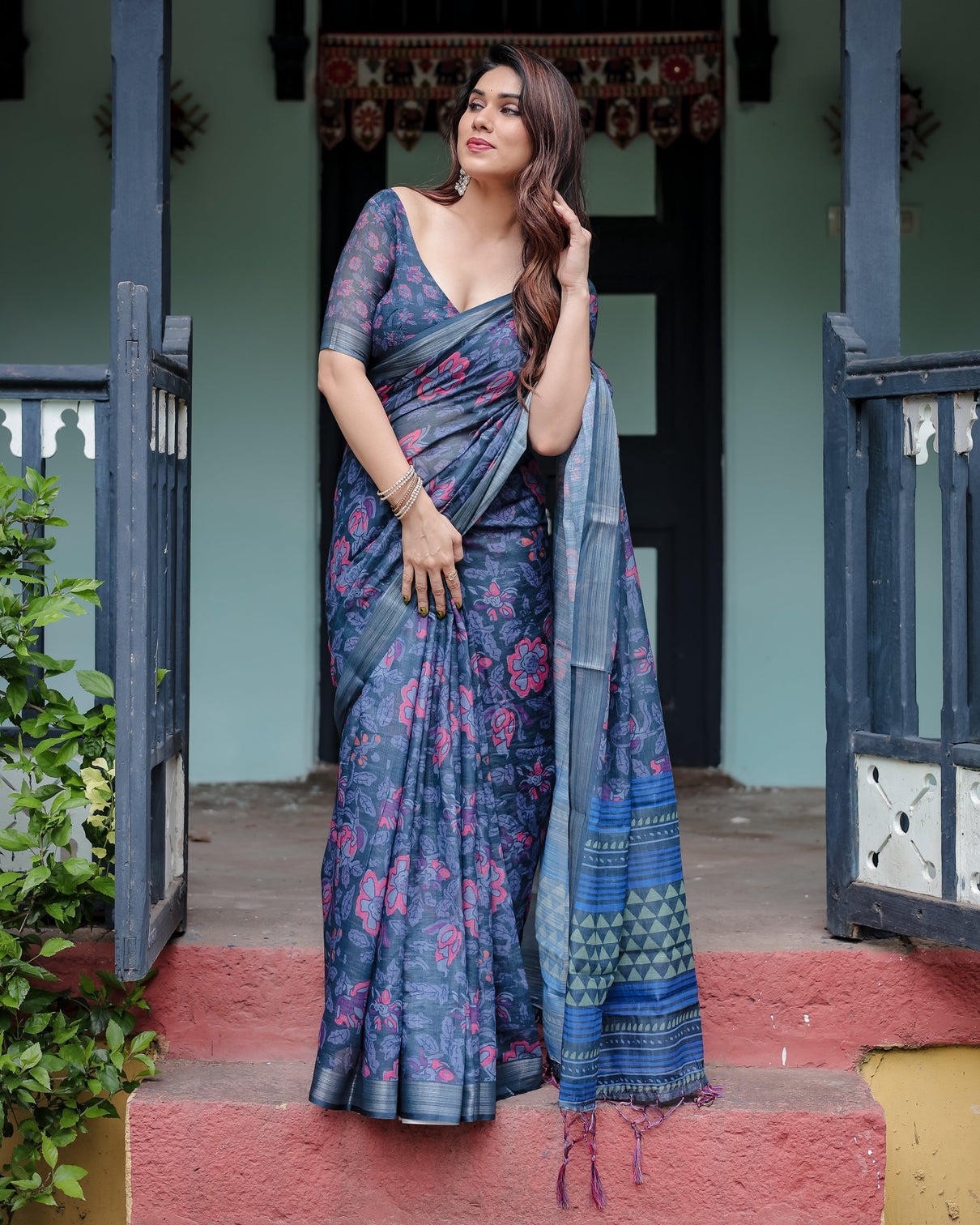 Navy blue pure cotton linen saree with floral print blouse and tassel detailing